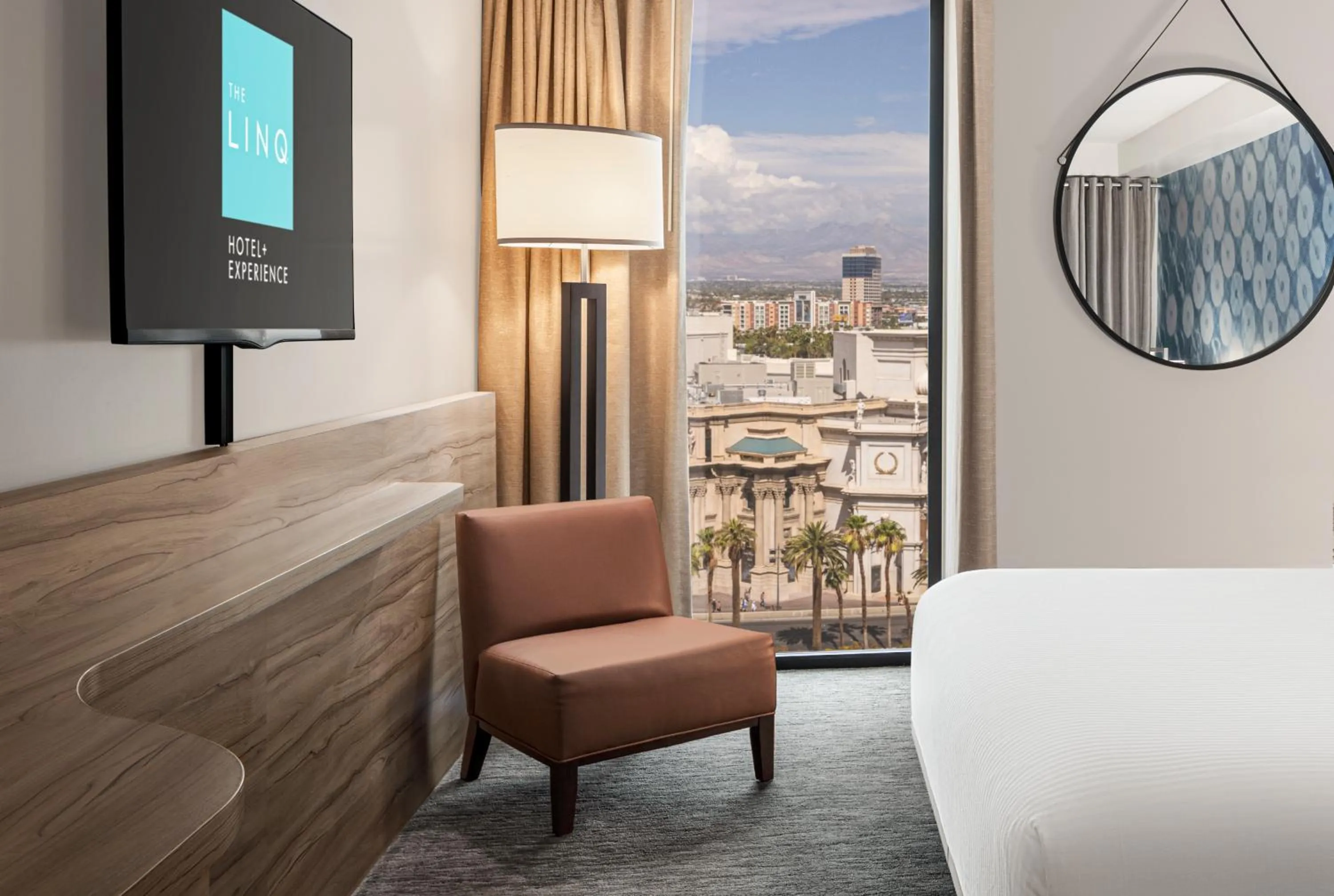 Seating area, Bed in The LINQ Hotel & Casino, A Caesars Destination