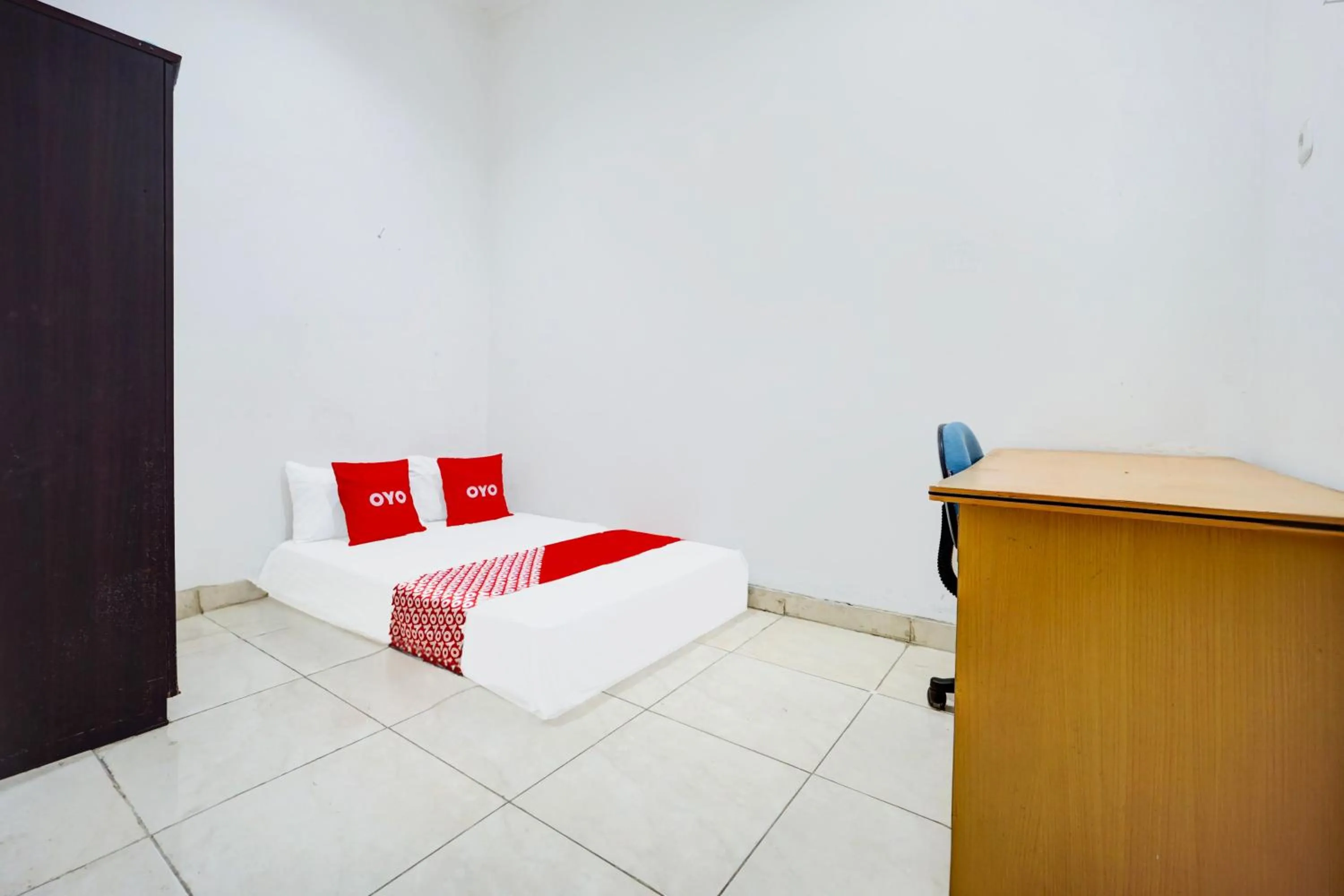 Bedroom, Bed in Hotel O MUMU HOMESTAYNearCarnival Park Surabaya