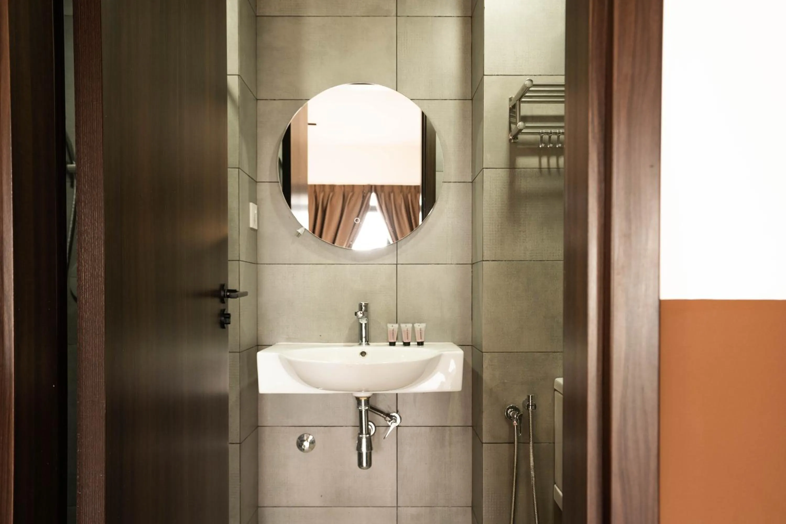 Bathroom in K Avenue by Pinstay