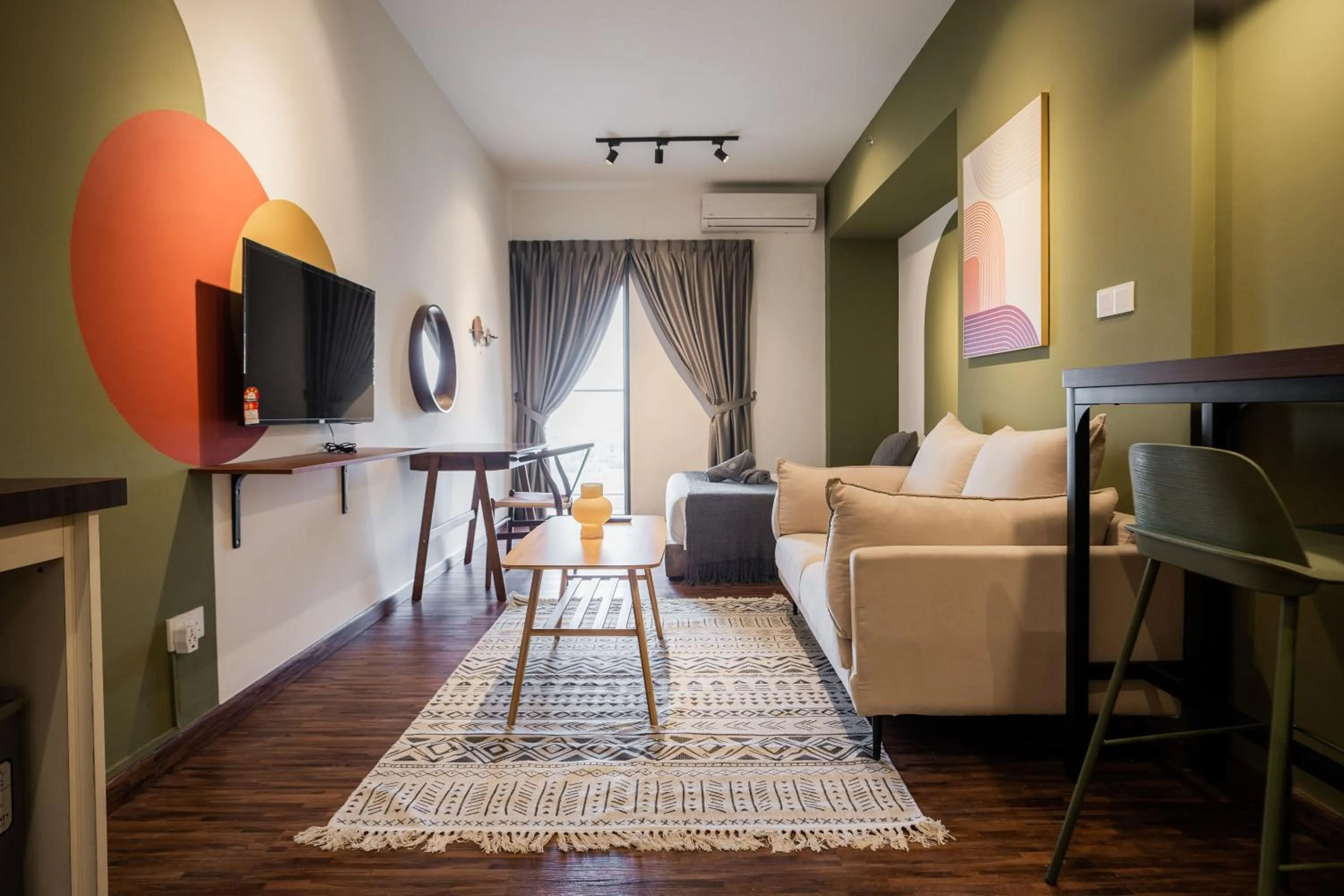 Living room in K Avenue by Pinstay