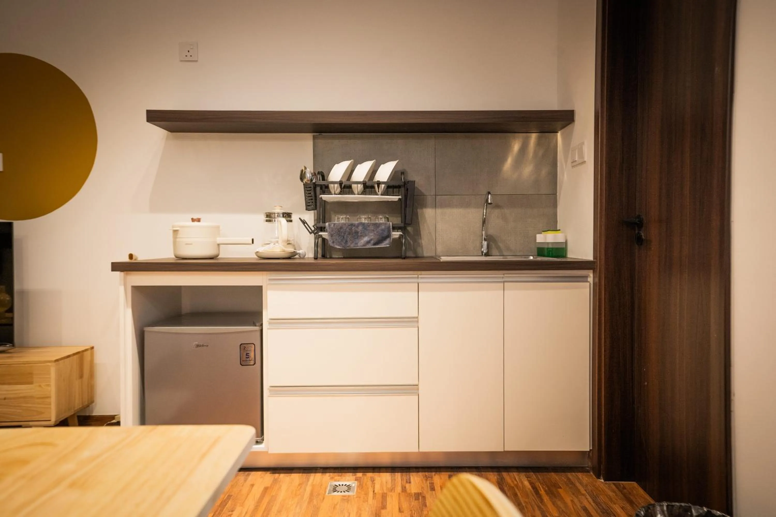 Kitchen or kitchenette in K Avenue by Pinstay