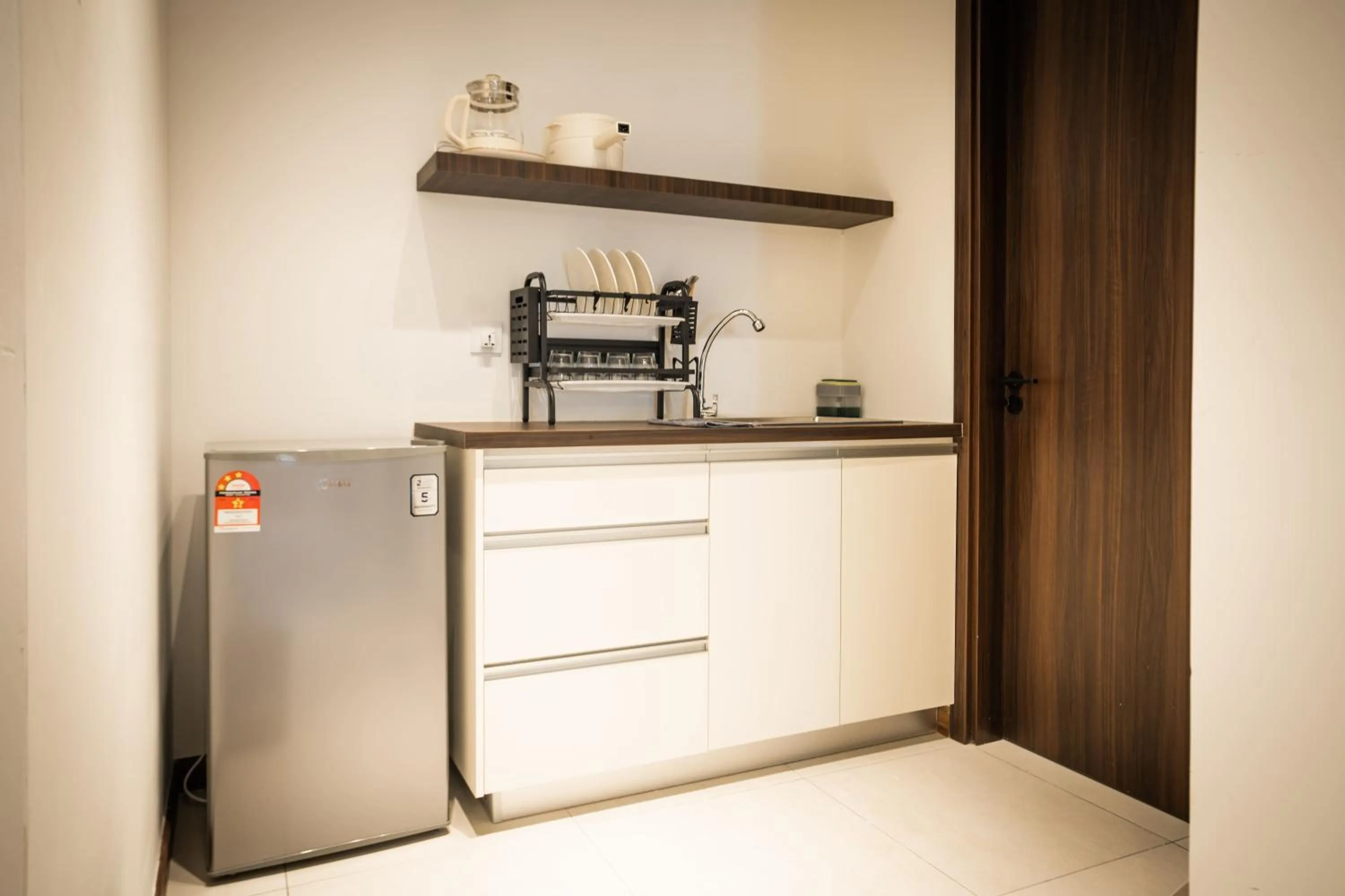 Kitchen or kitchenette in K Avenue by Pinstay