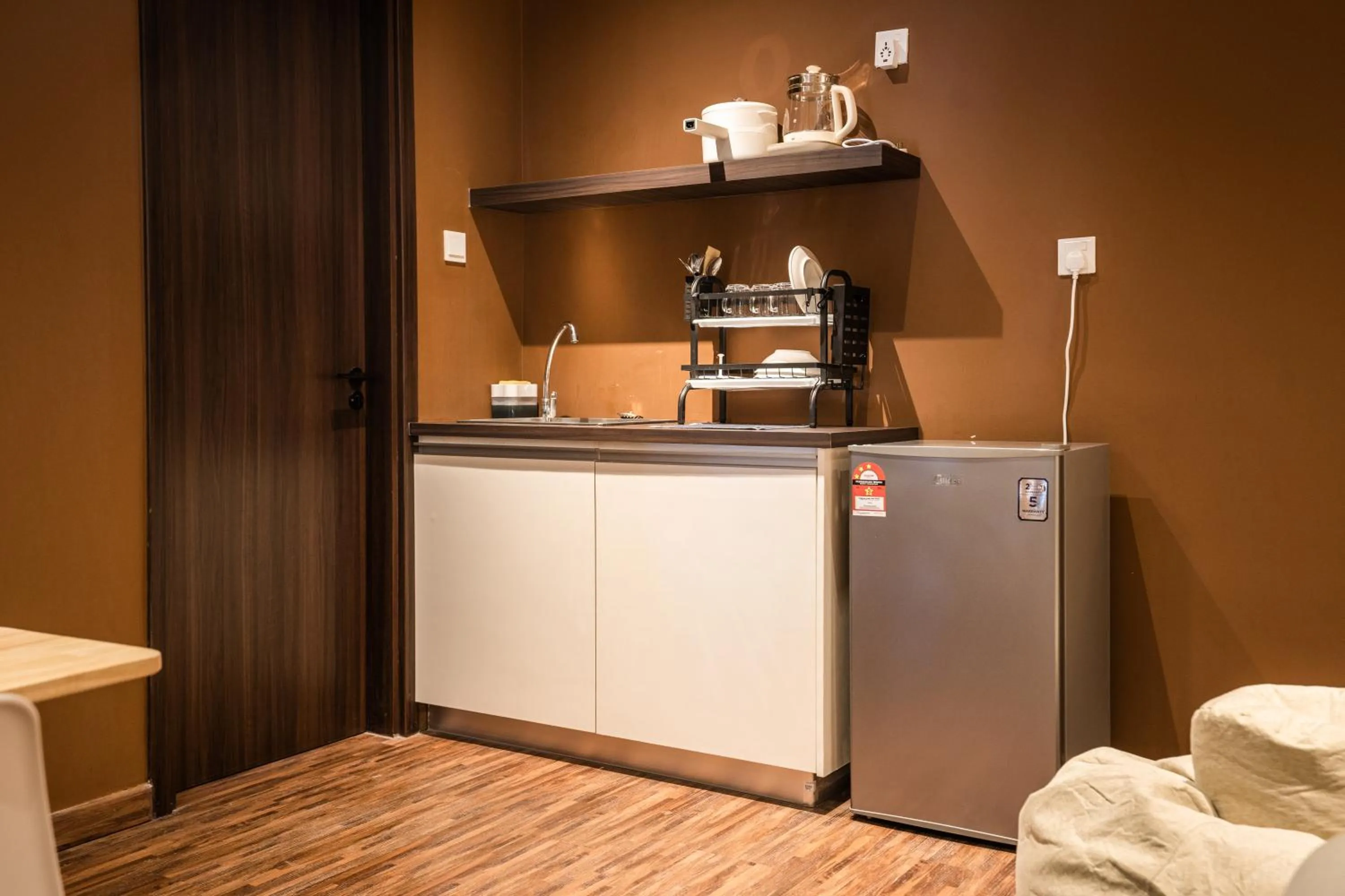 Kitchen or kitchenette in K Avenue by Pinstay