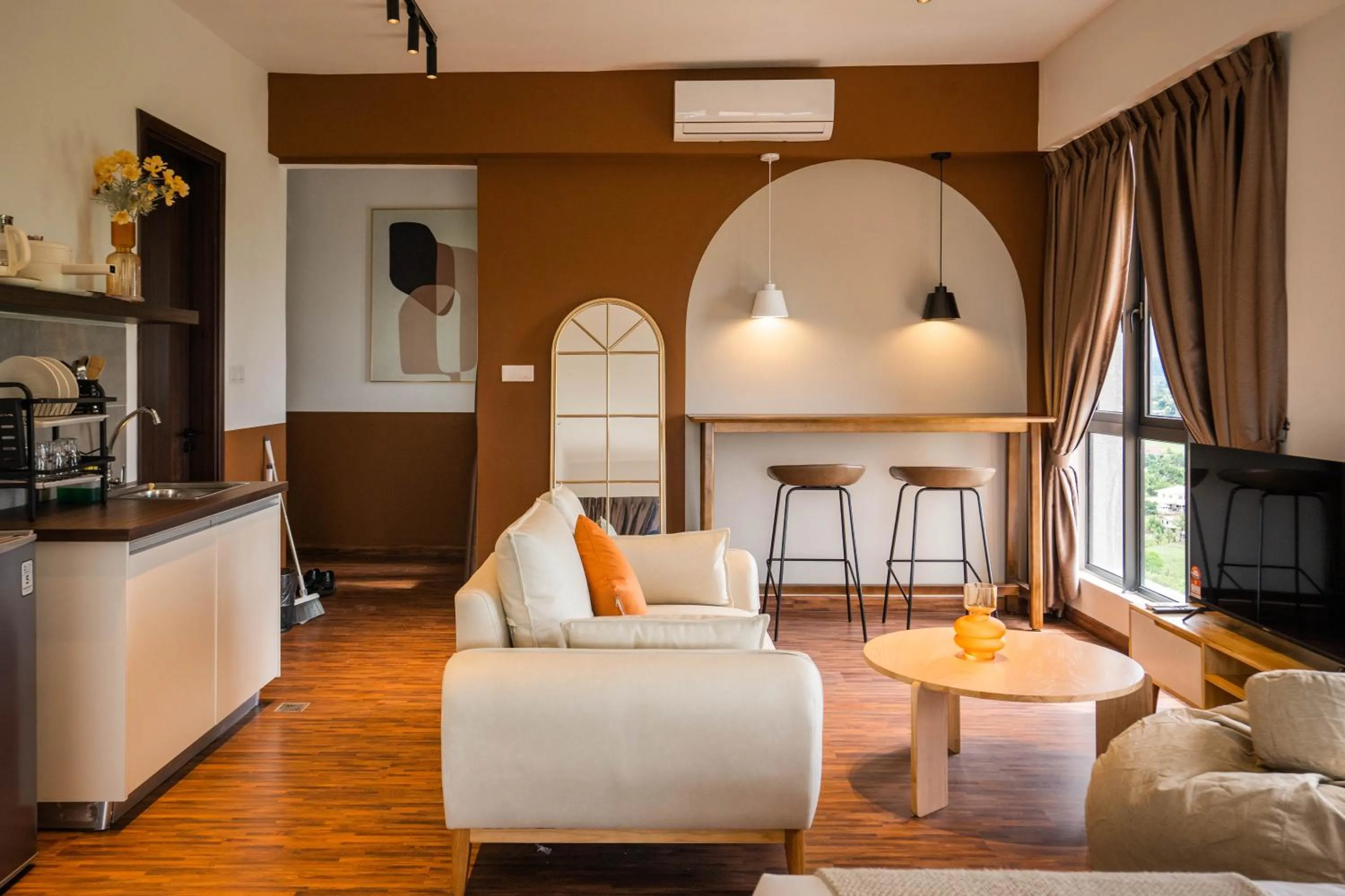 Living room in K Avenue by Pinstay