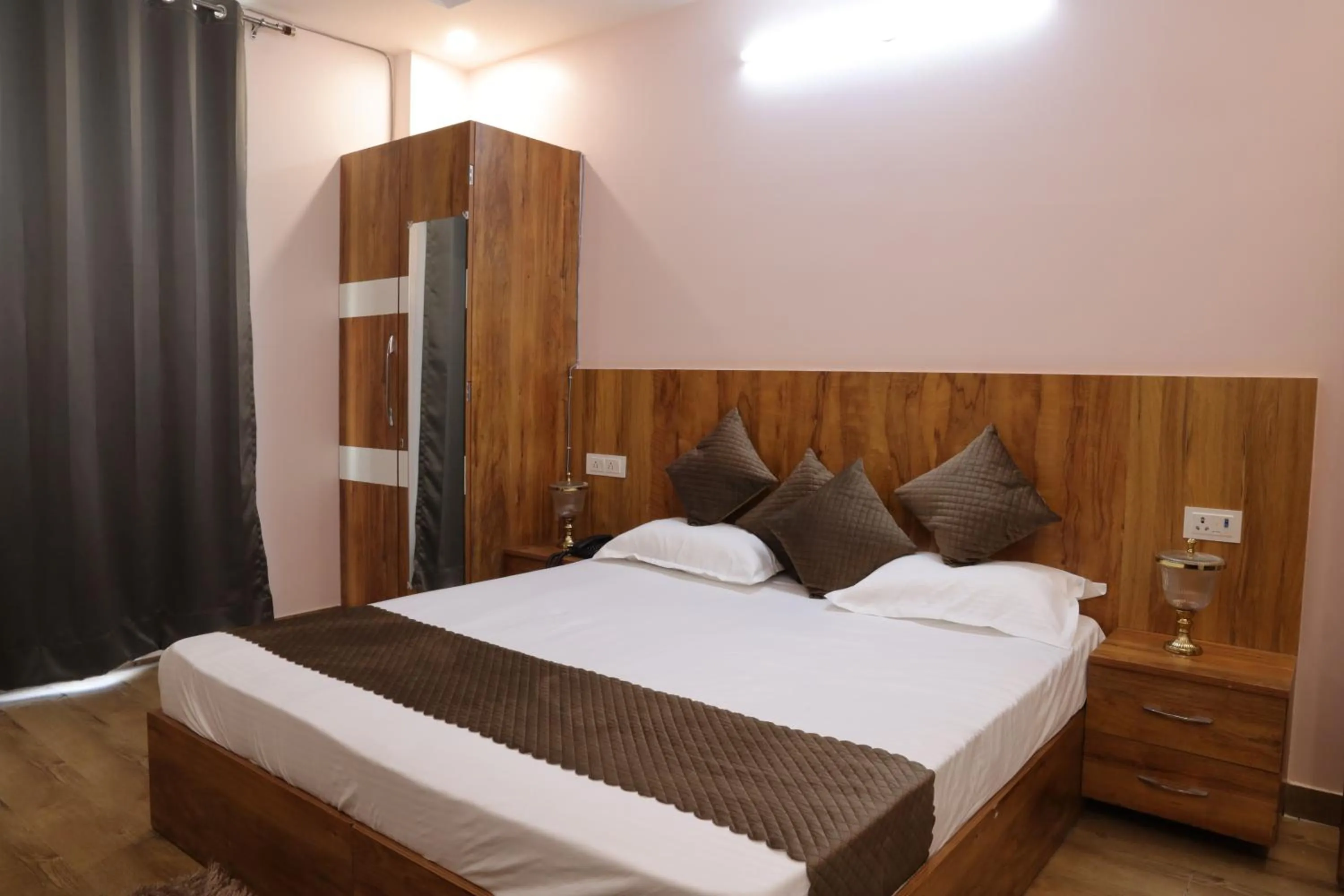 Bed in The Sandalwood Hotel I Sec-38 I Near Medanta Medicity Gurgaon