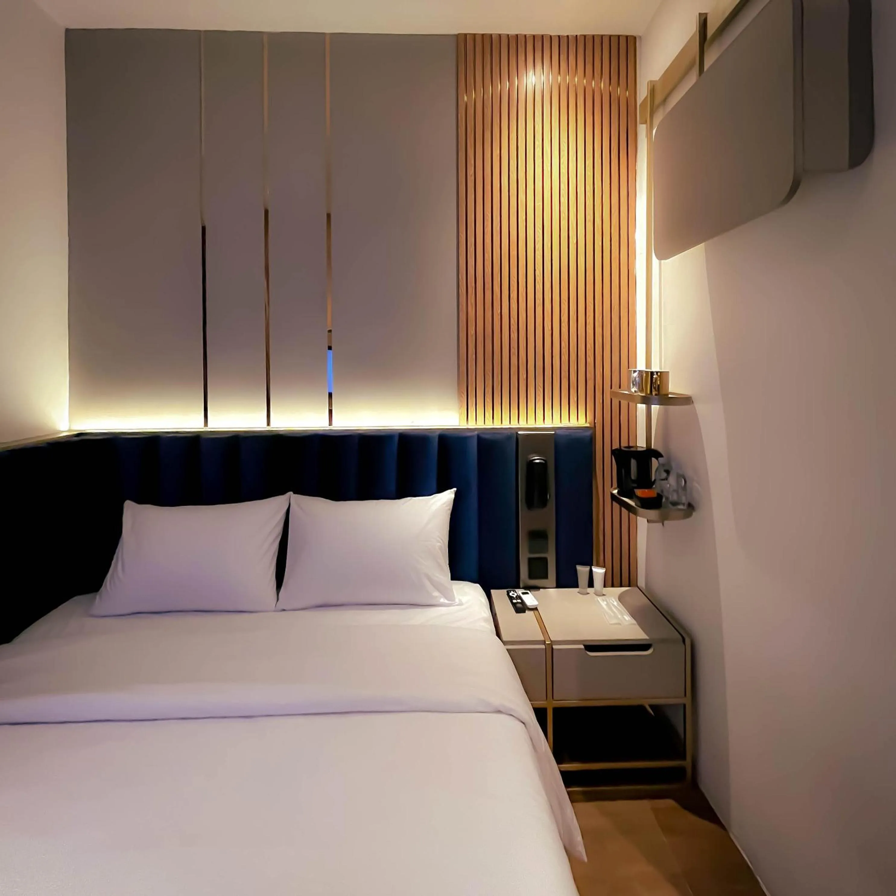 Bed in Qube Hotel by 98hospitality