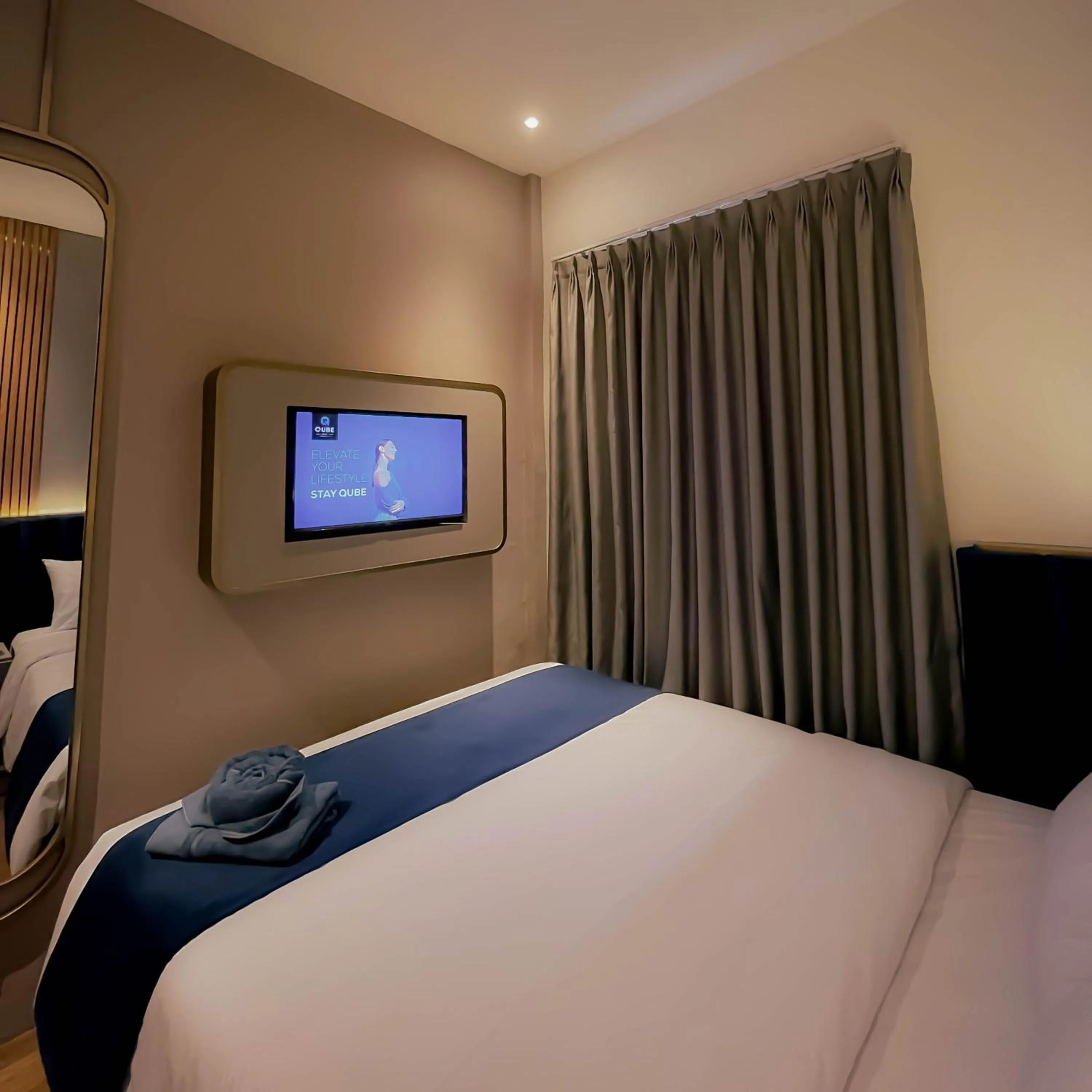Bed in Qube Hotel by 98hospitality