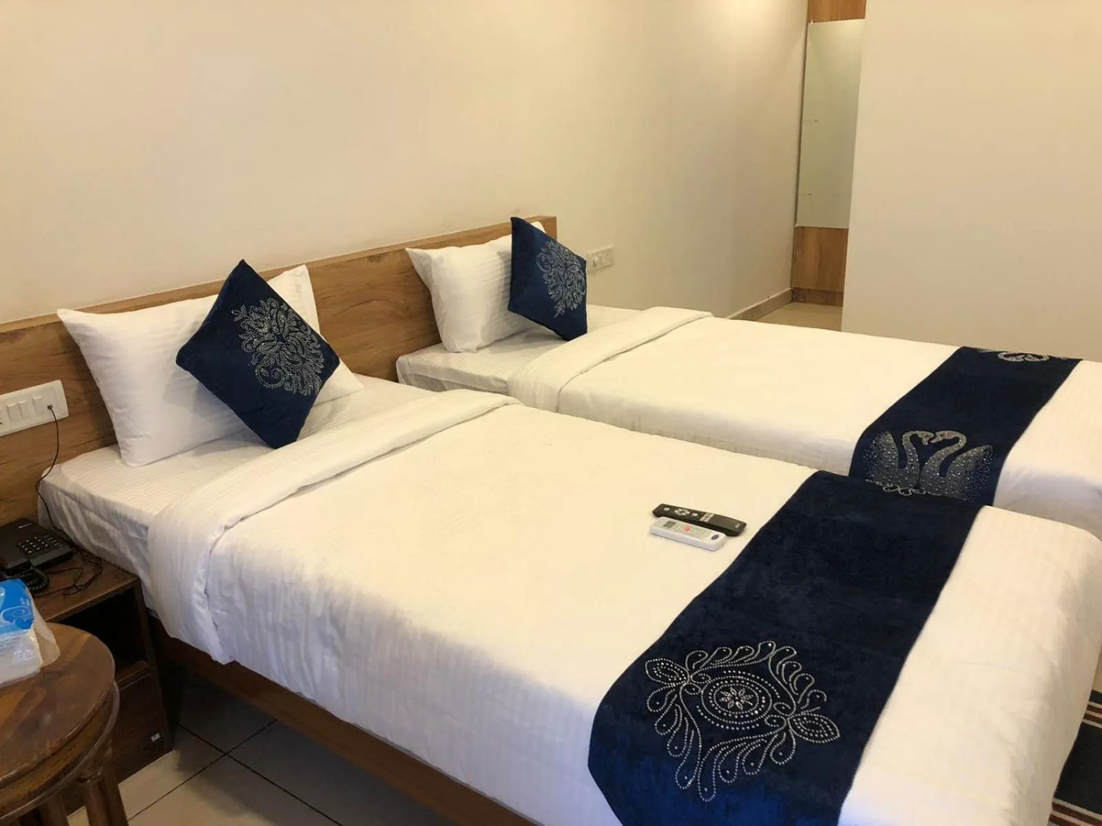 Bed in Hotel Amulya Regency