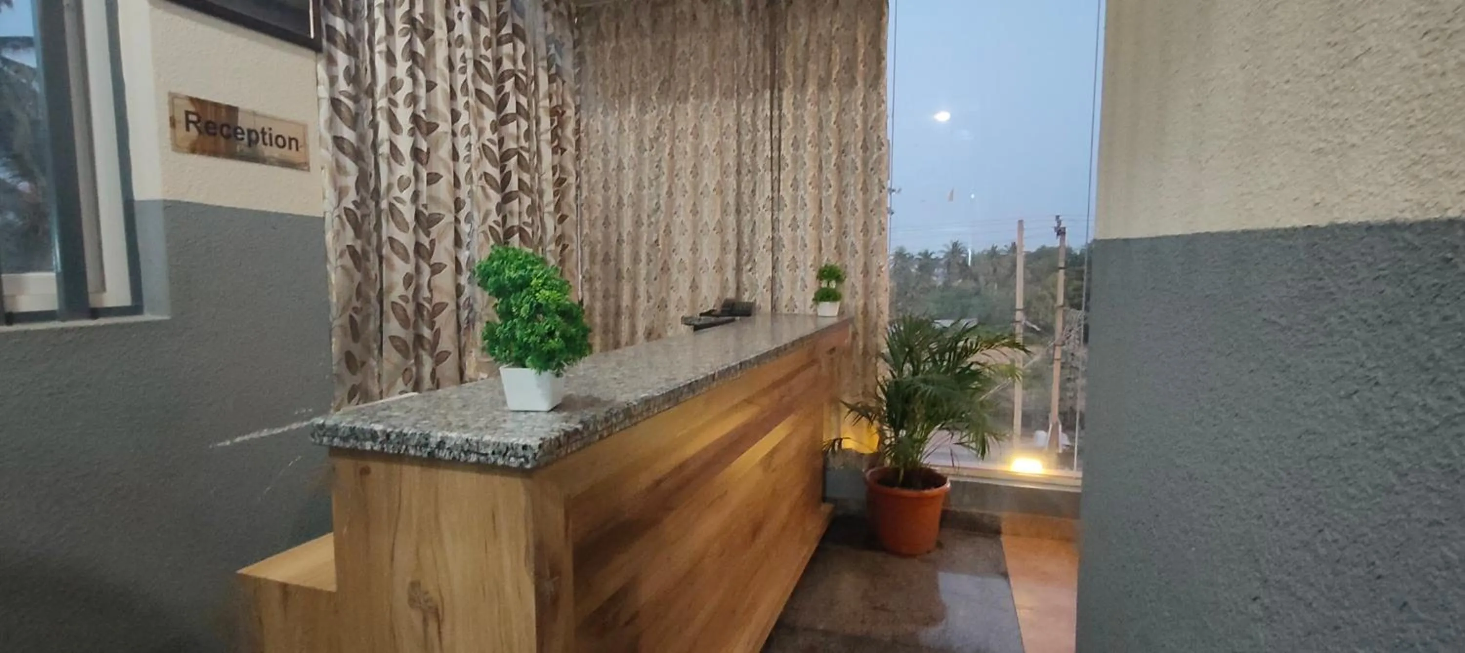 Lobby or reception in Hotel Amulya Regency