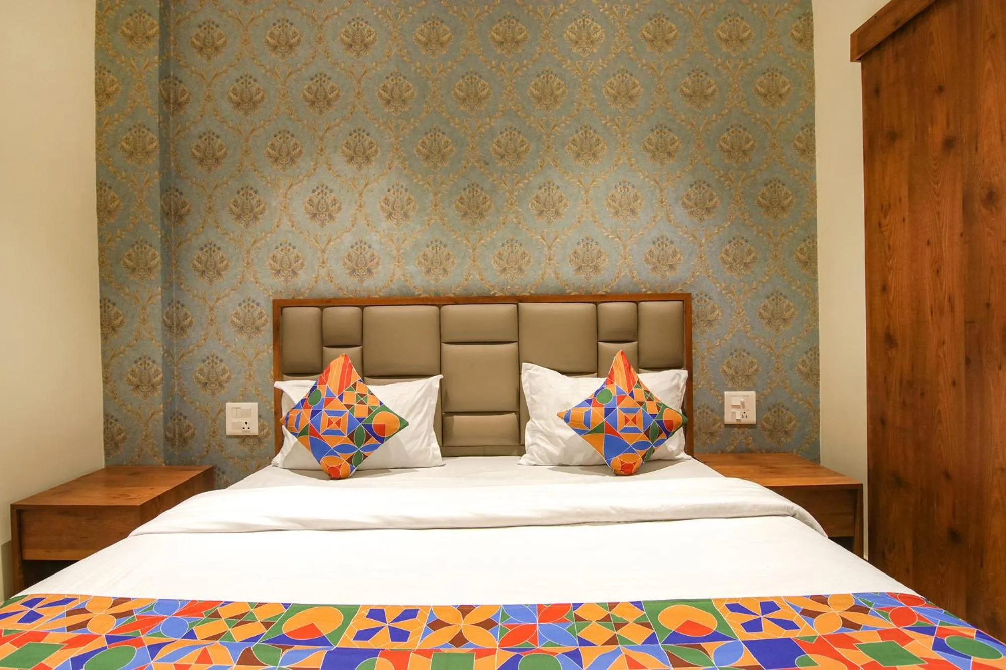 Bed in FabHotel K9 Regency