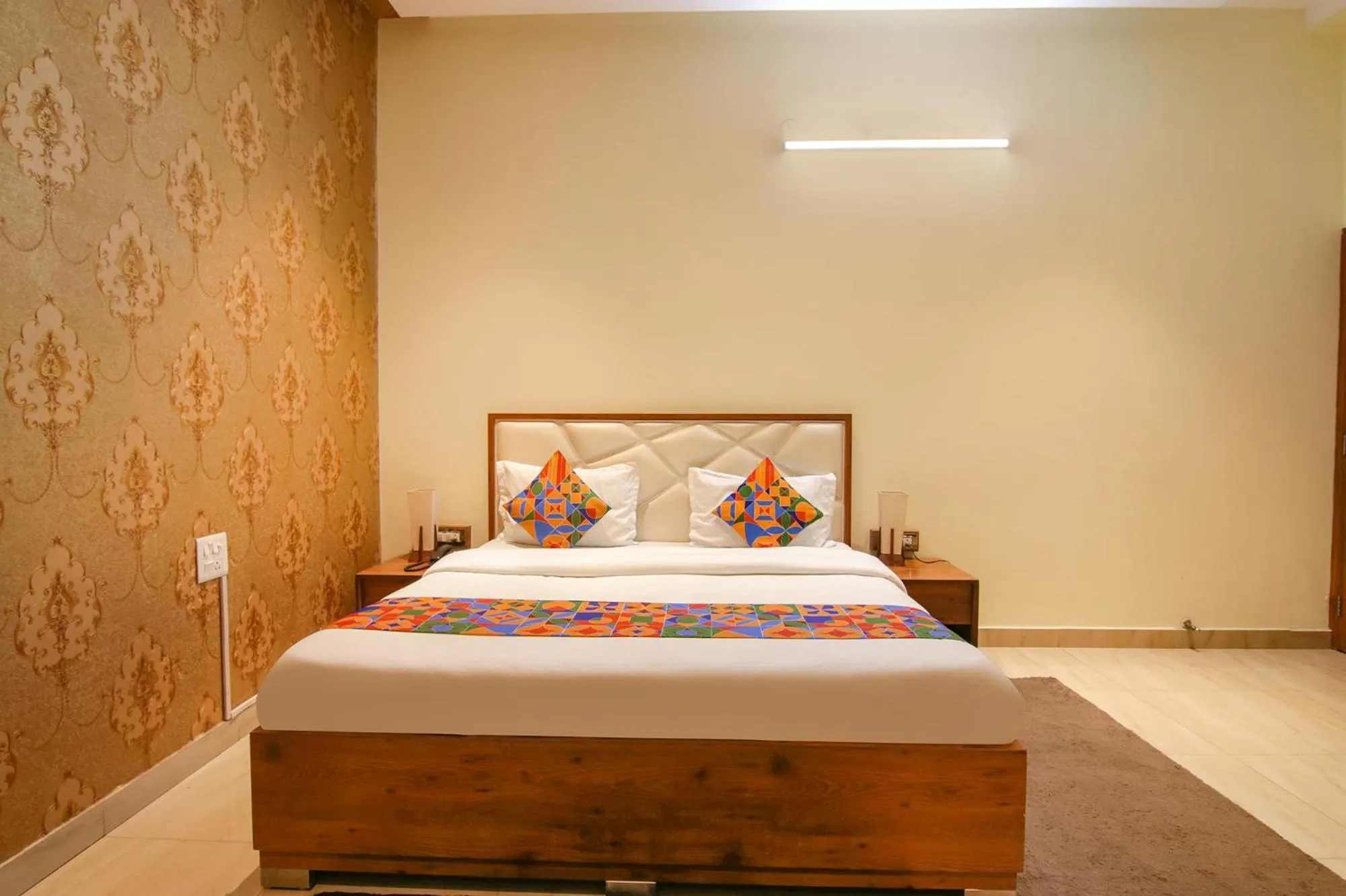 Bed in FabHotel K9 Regency