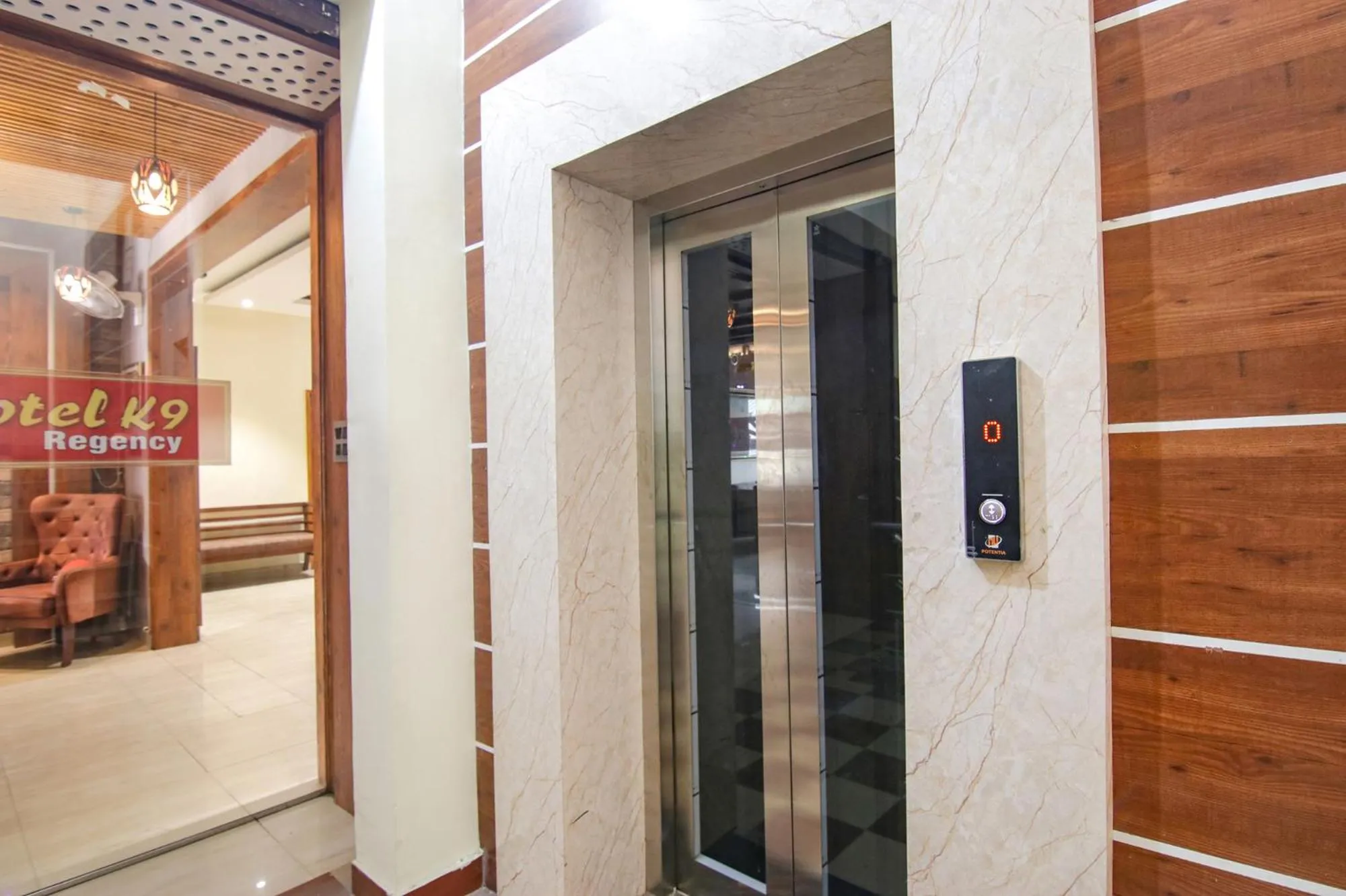 elevator in FabHotel K9 Regency