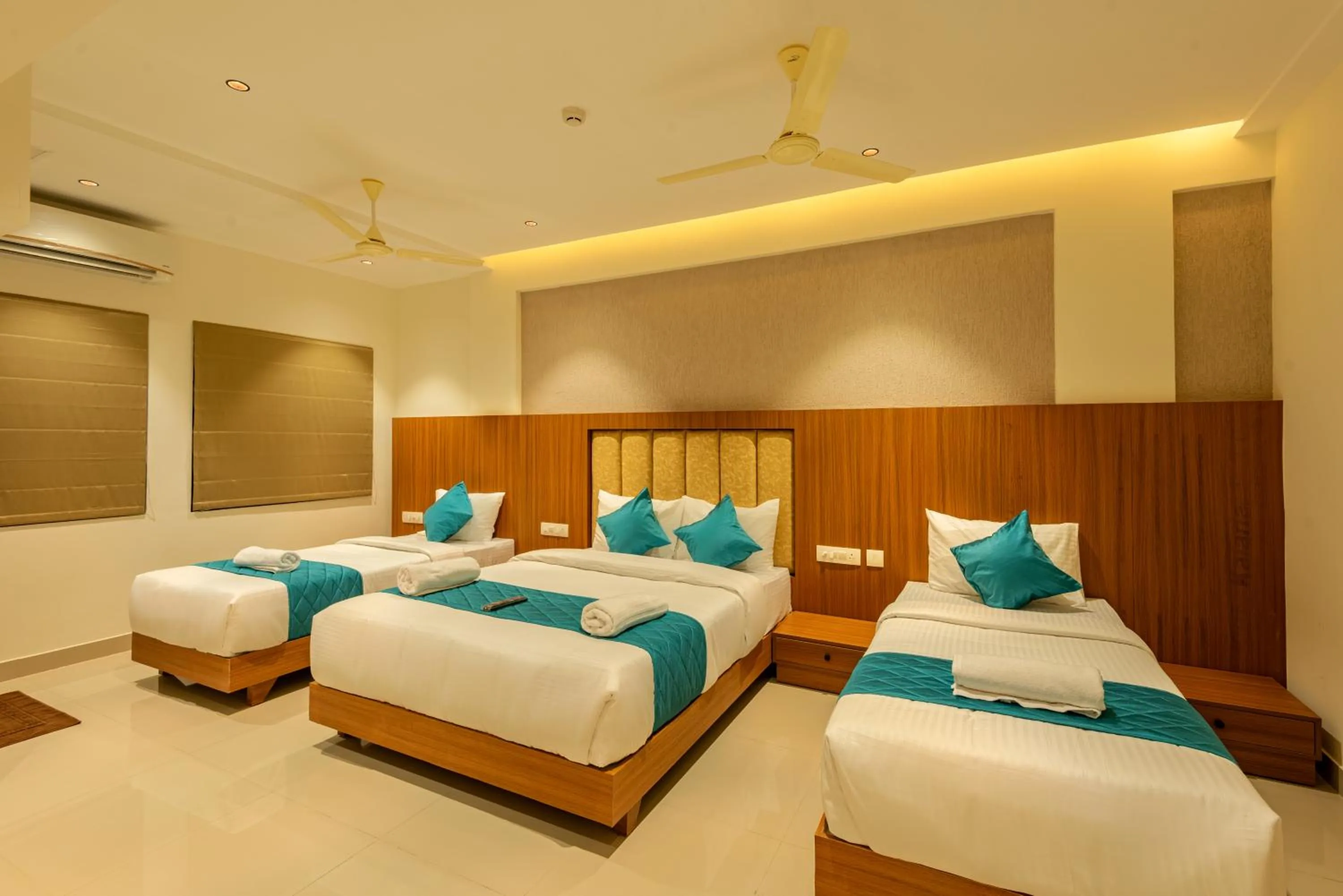 Bed in Hotel Stay Bella Kozhikode