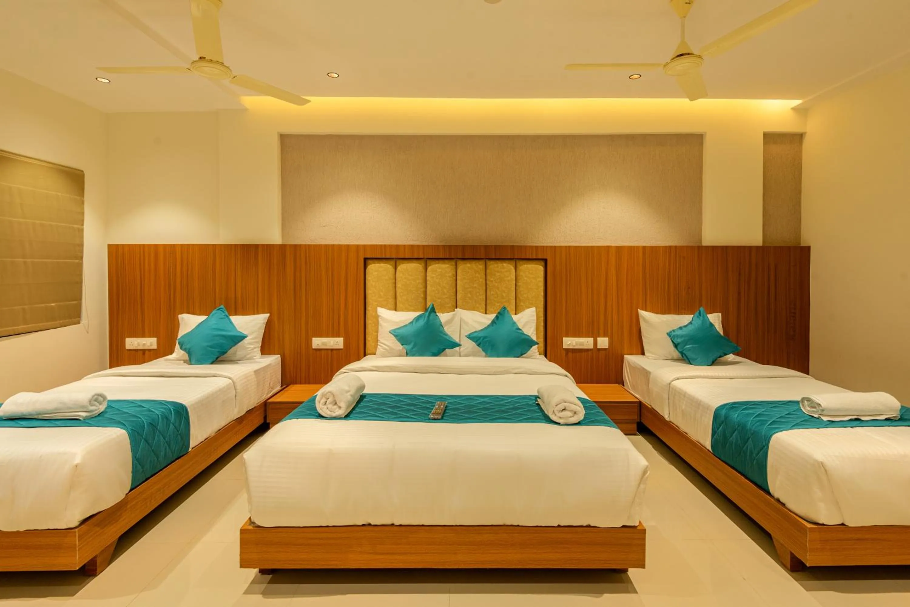 Bed in Hotel Stay Bella Kozhikode
