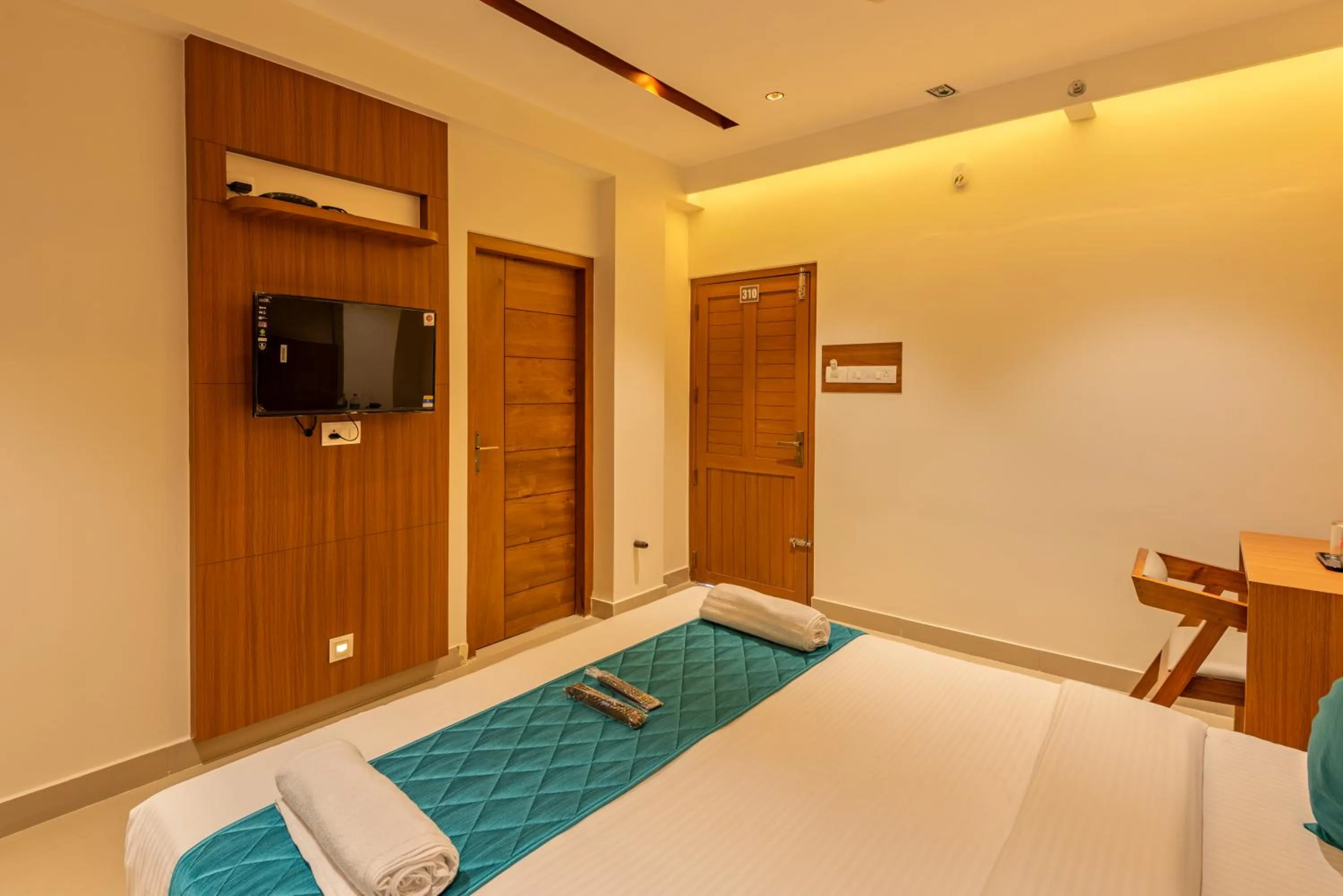 Bedroom, Bed in Hotel Stay Bella Kozhikode