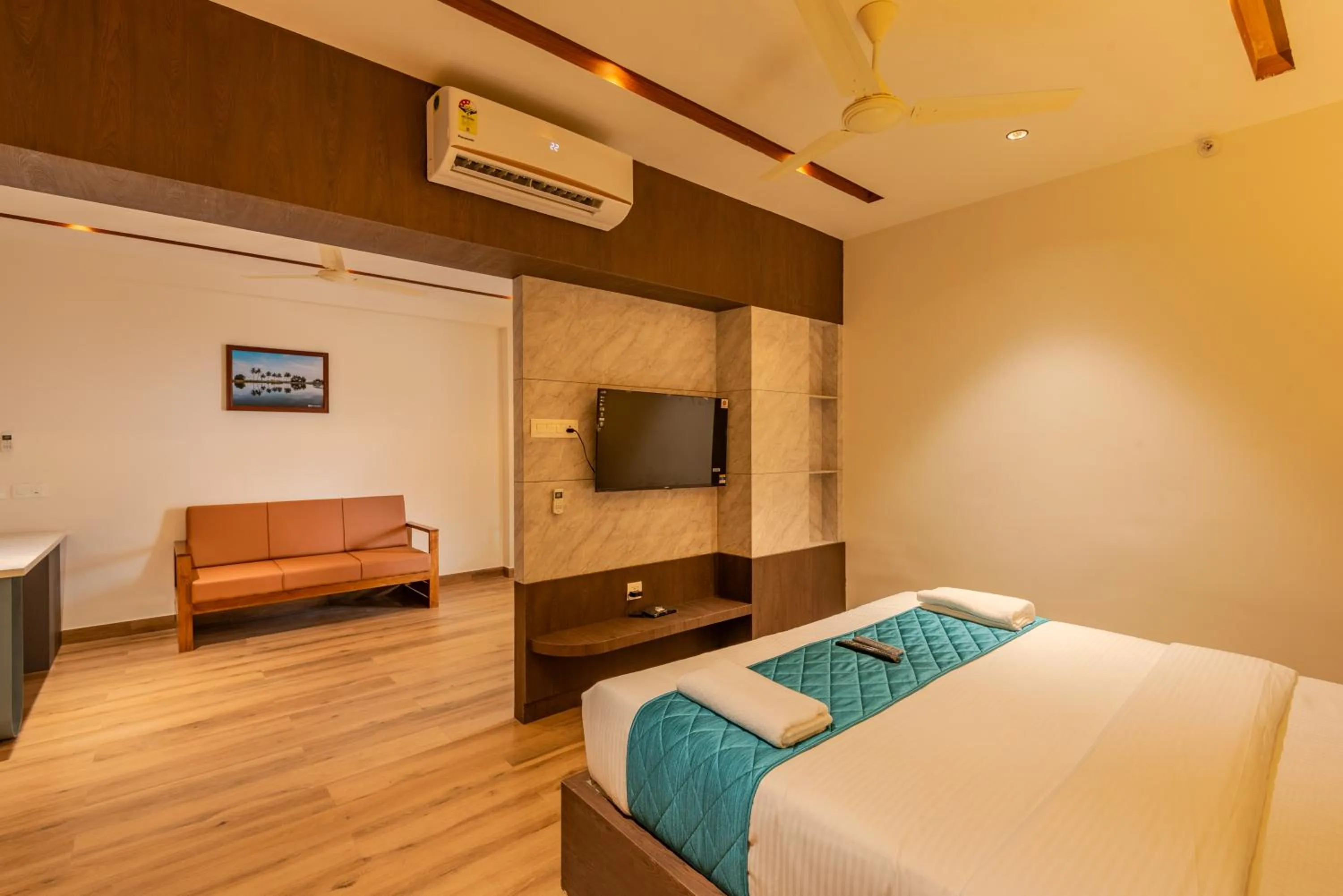 Bed in Hotel Stay Bella Kozhikode