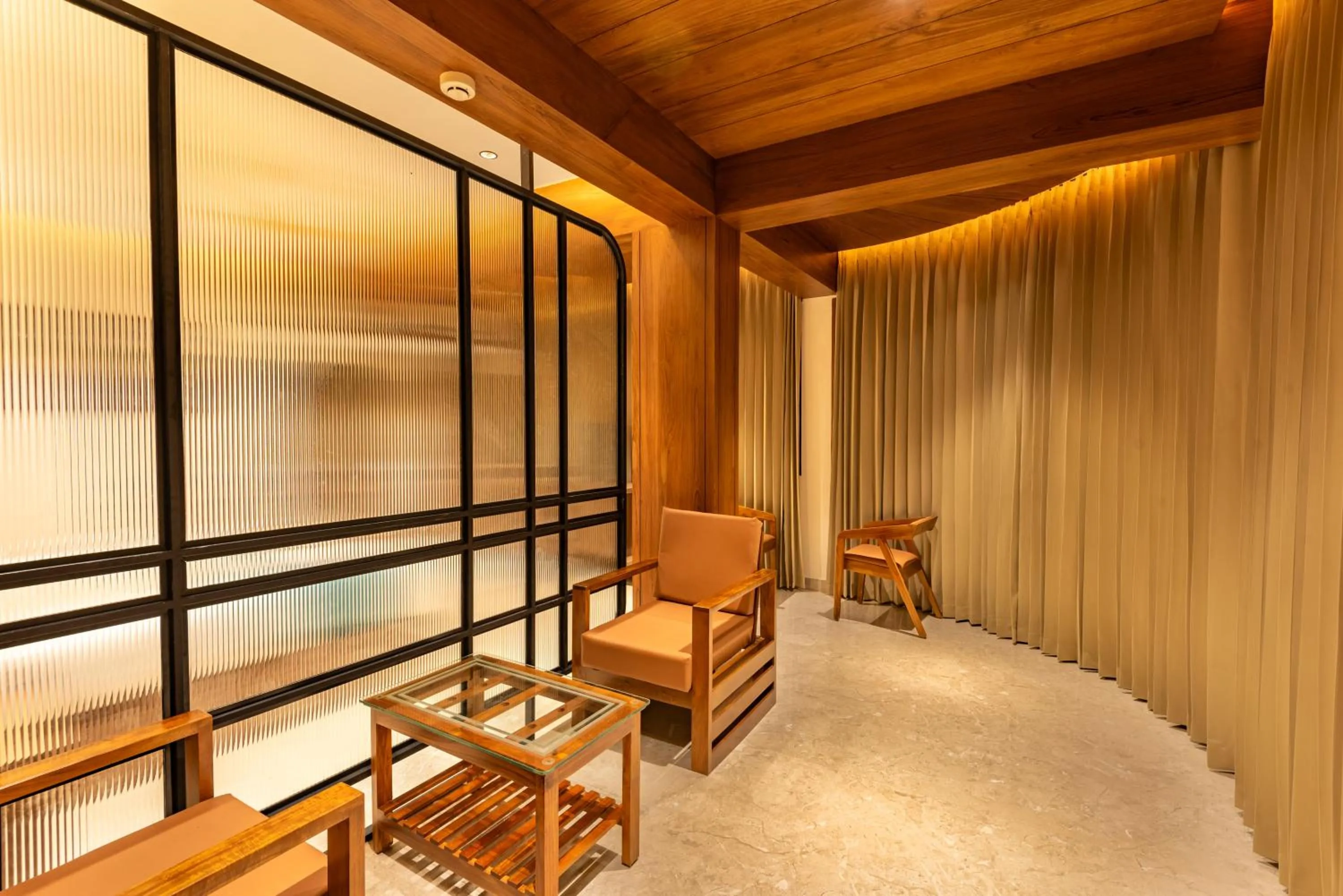 Seating area in Hotel Stay Bella Kozhikode