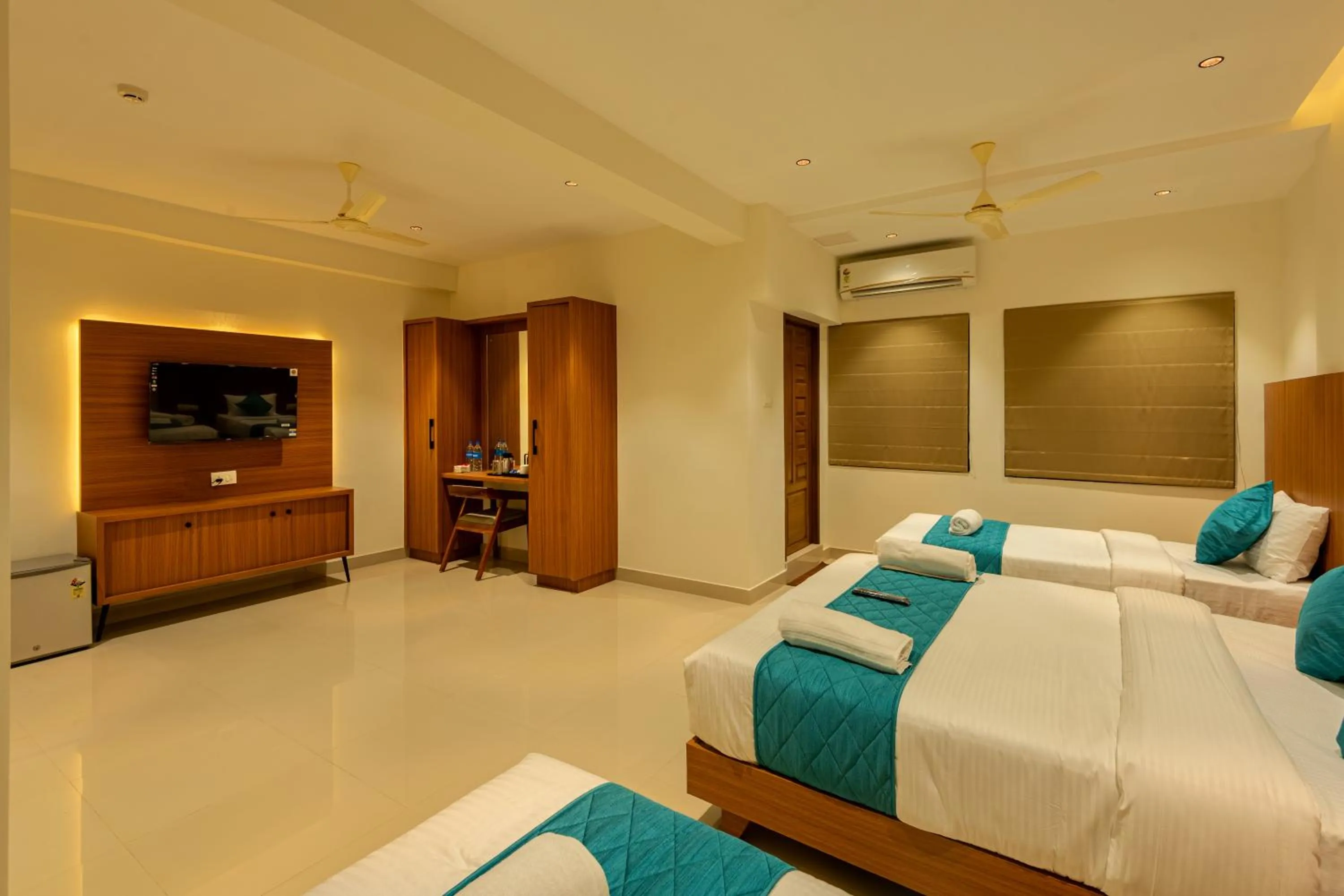 Bed in Hotel Stay Bella Kozhikode