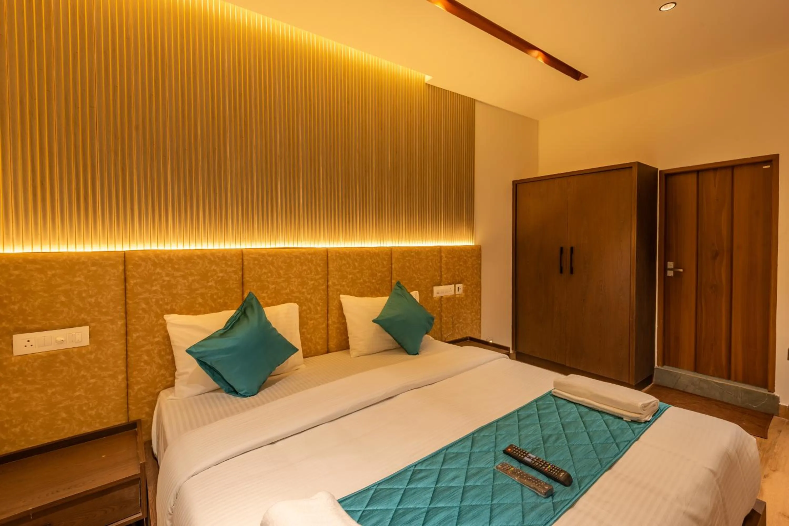 Bed in Hotel Stay Bella Kozhikode