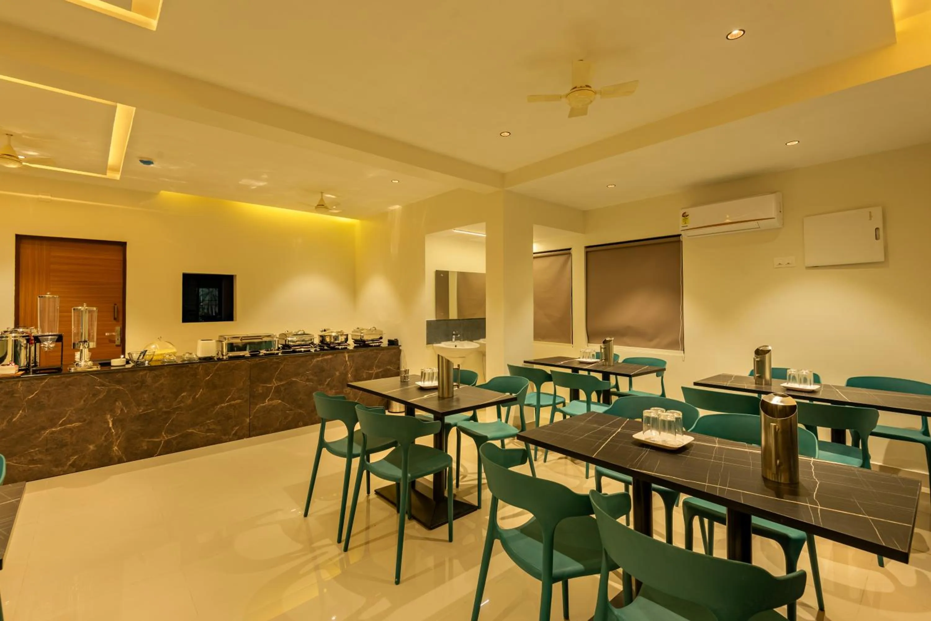 Seating area in Hotel Stay Bella Kozhikode