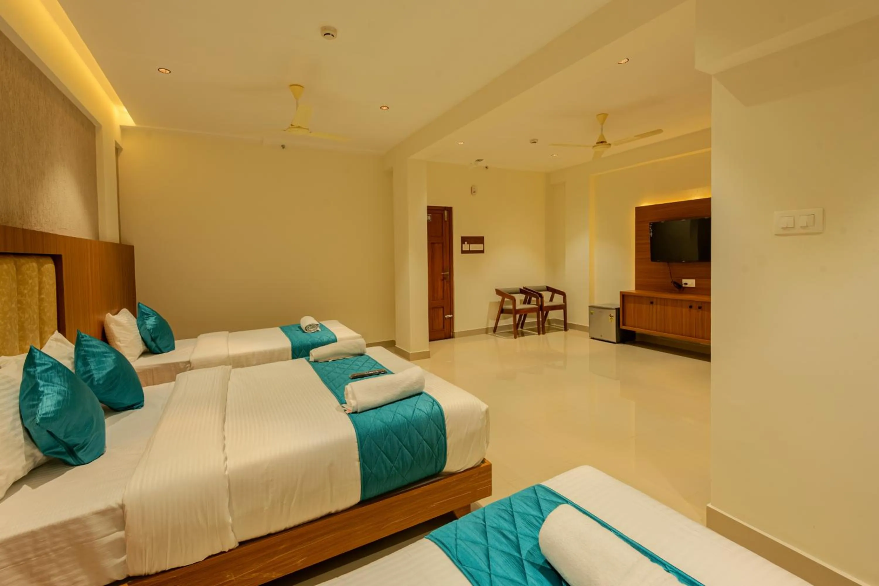 Bed in Hotel Stay Bella Kozhikode
