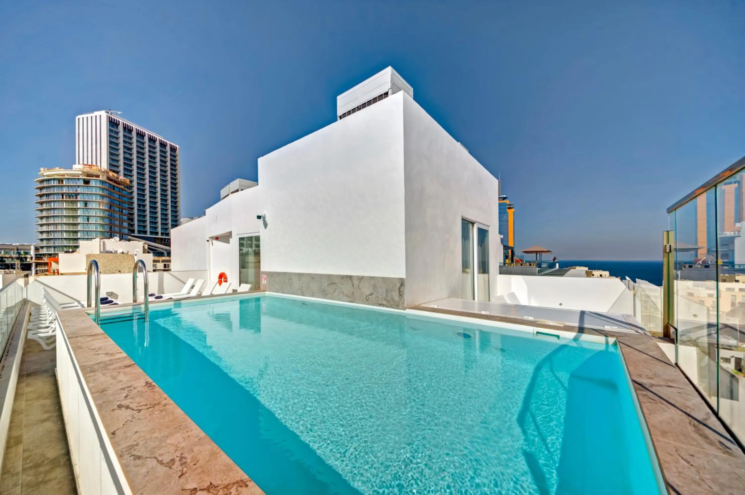 Swimming pool in QUADRO Hotel