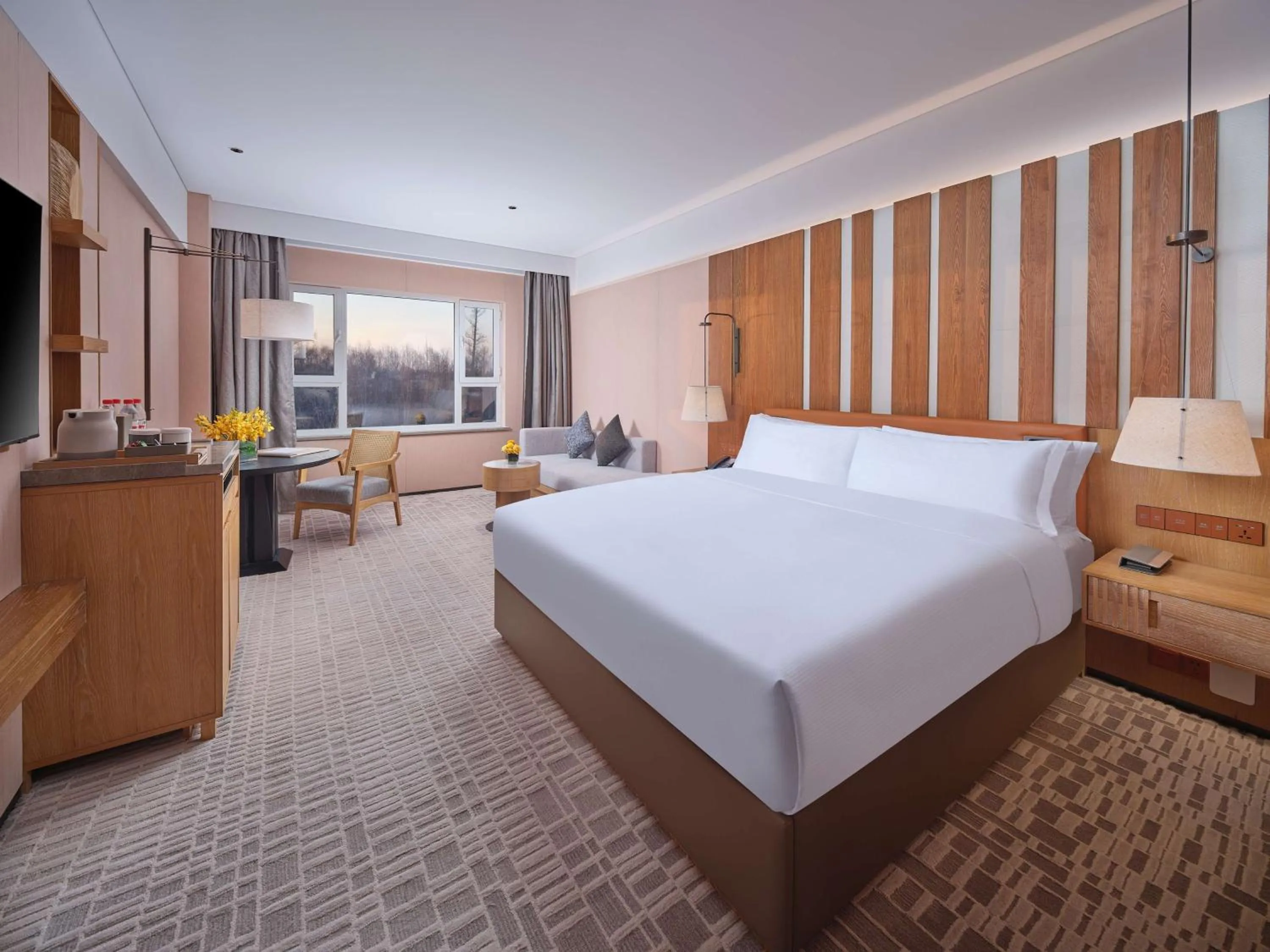 Living room, Bed in DoubleTree by Hilton Changbaishan Hot Spring