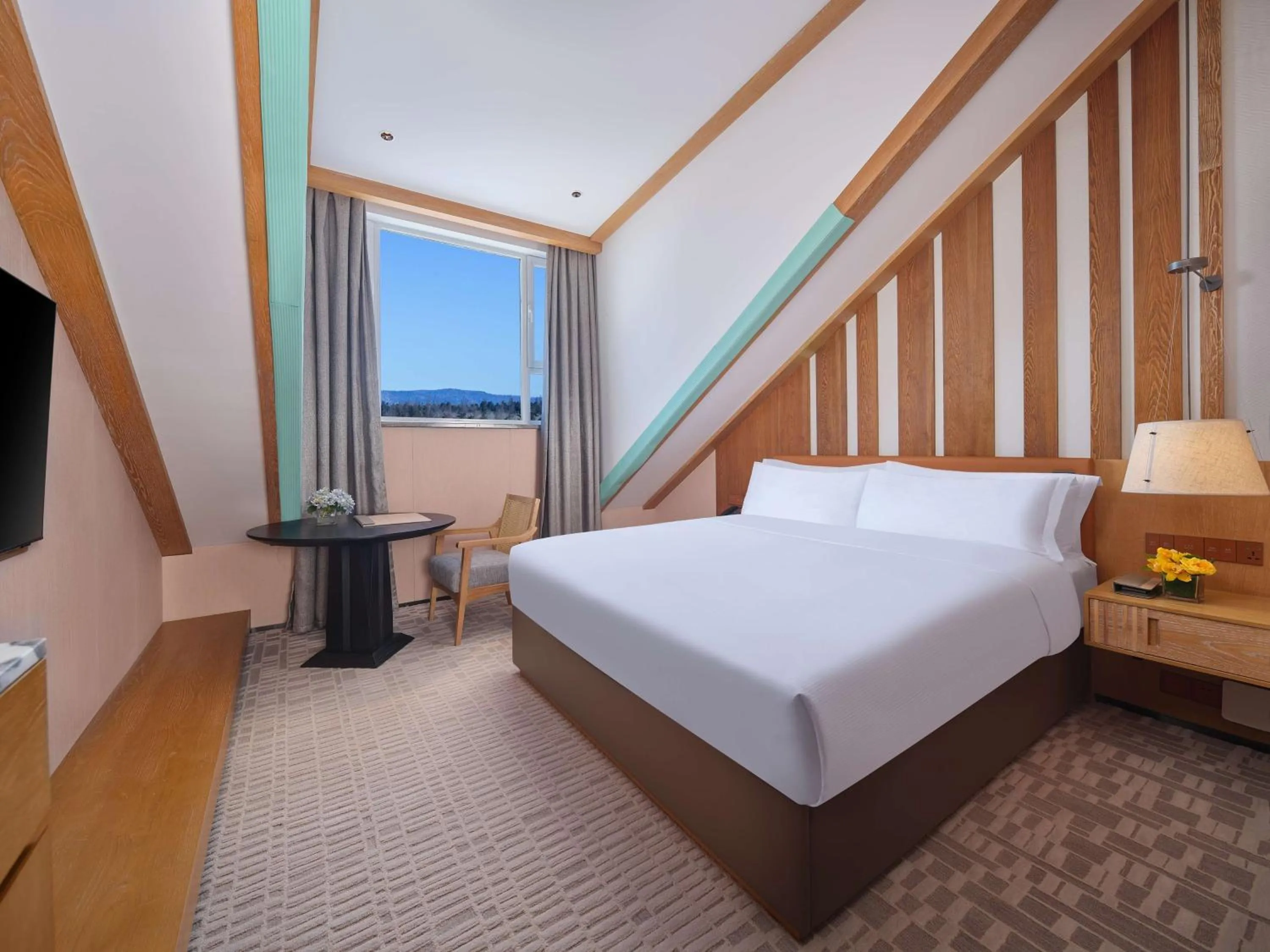 Bed in DoubleTree by Hilton Changbaishan Hot Spring