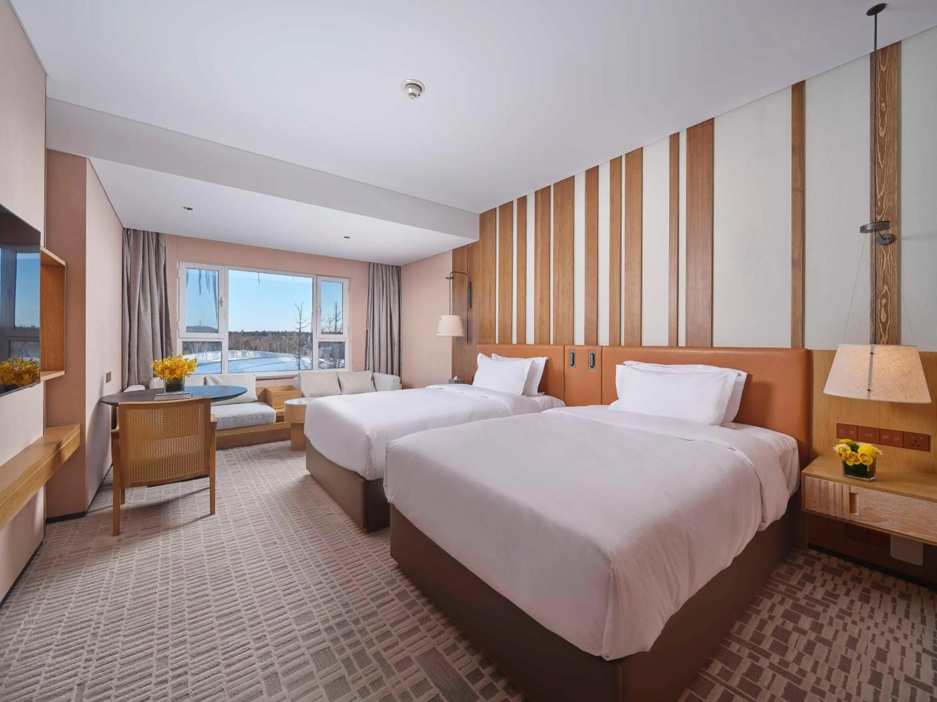 Bed in DoubleTree by Hilton Changbaishan Hot Spring