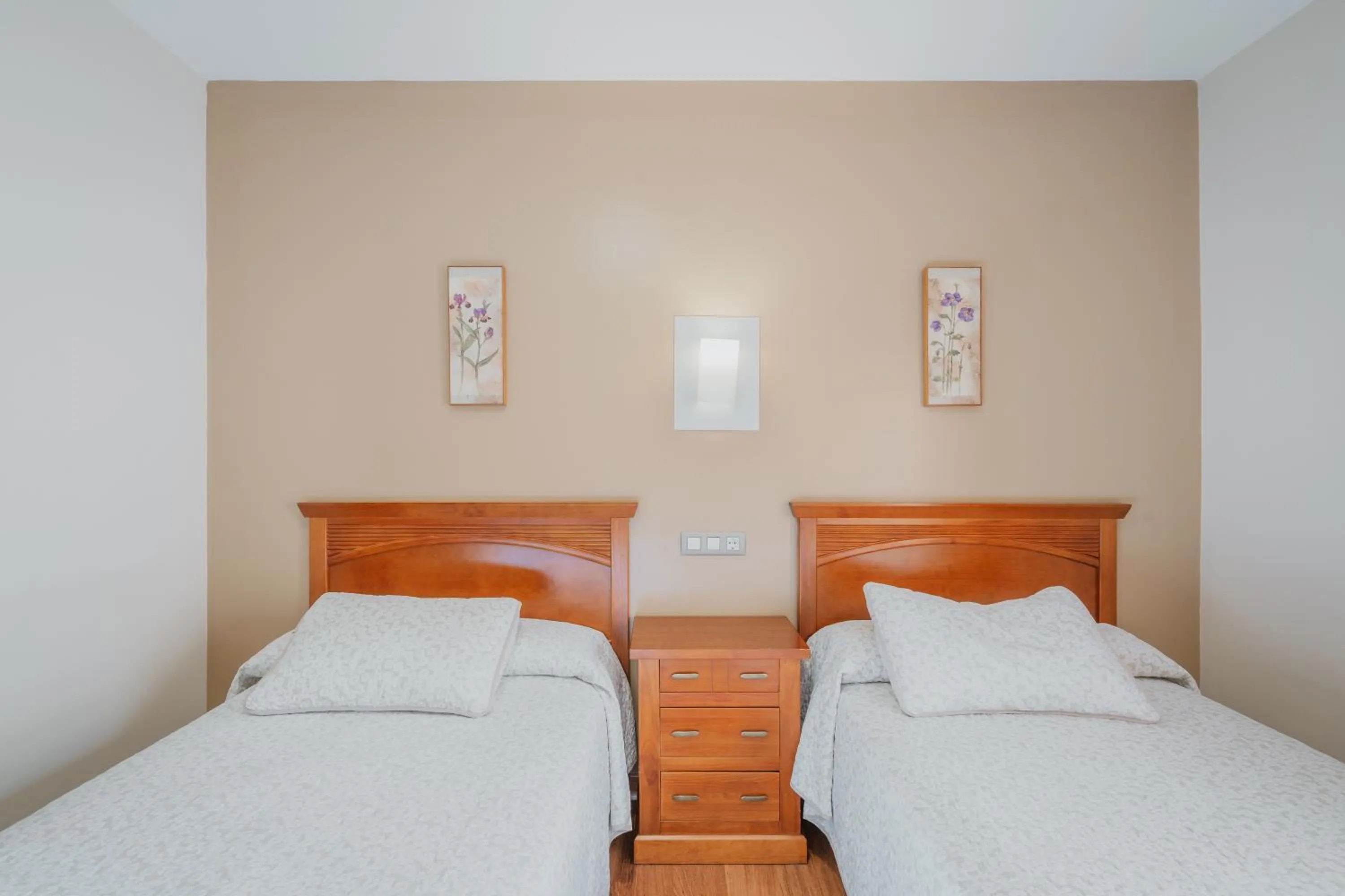 Bed in Hotel Reina Isabel