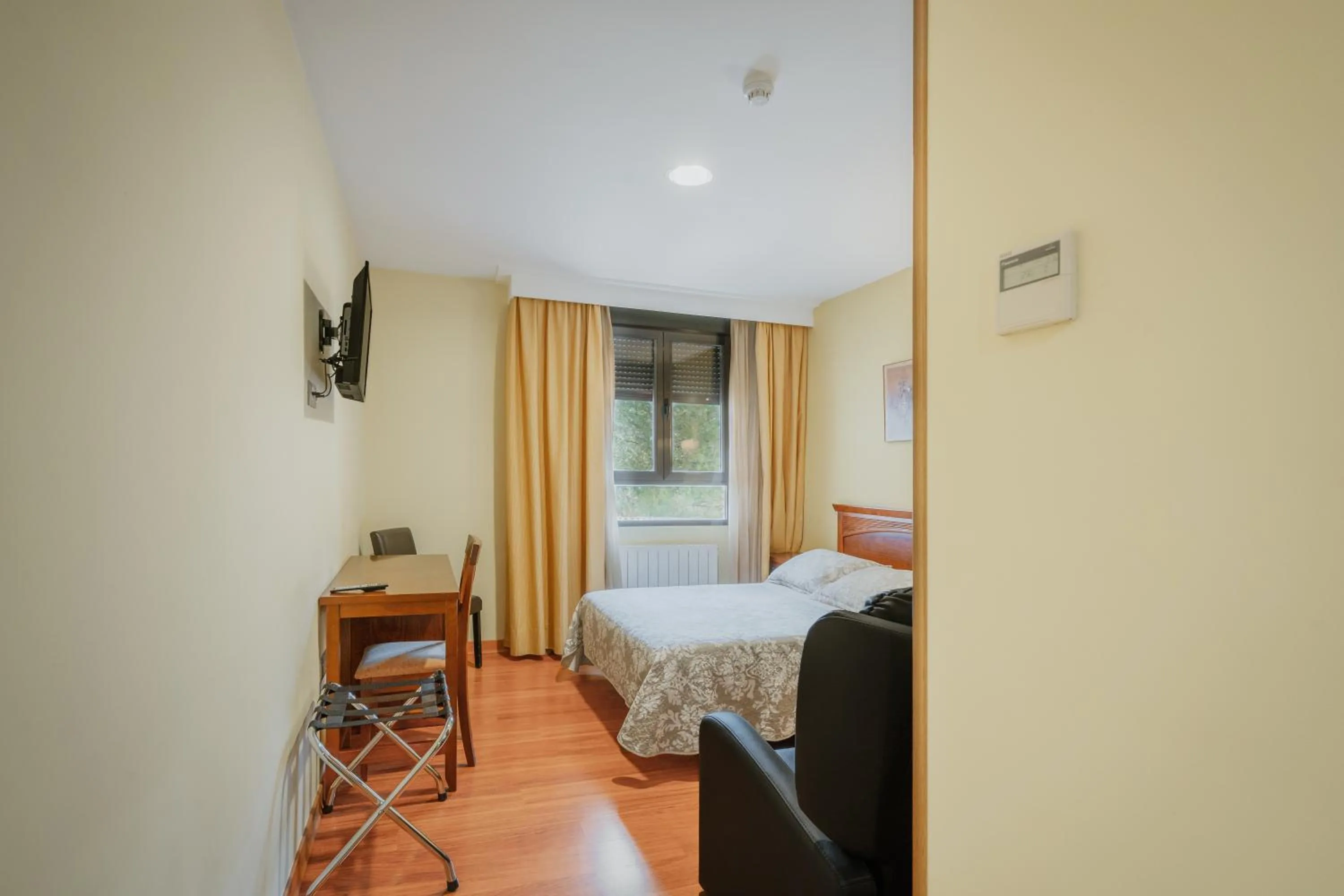 Bed in Hotel Reina Isabel