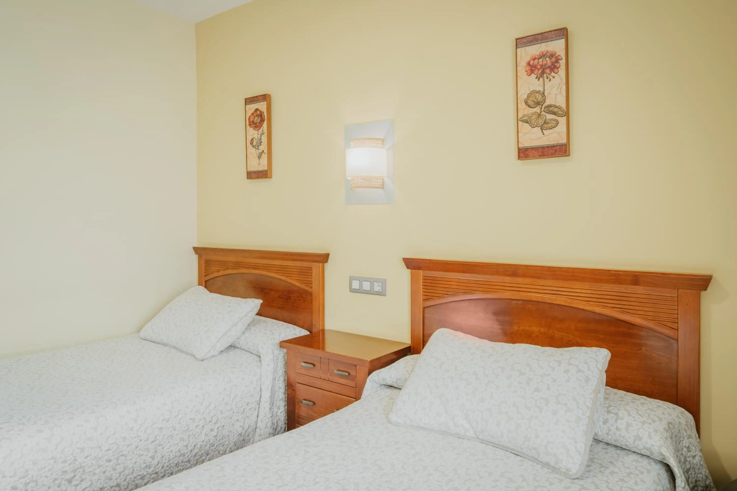 Bed in Hotel Reina Isabel