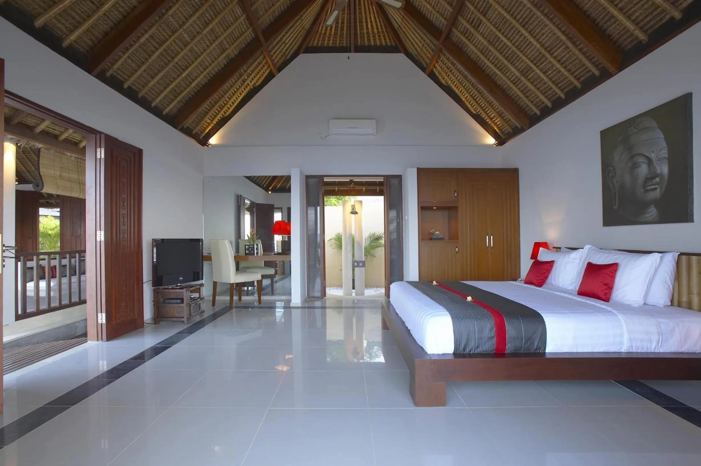 Photo of the whole room, Bed in Siddhartha Oceanfront Resort & Spa Bali