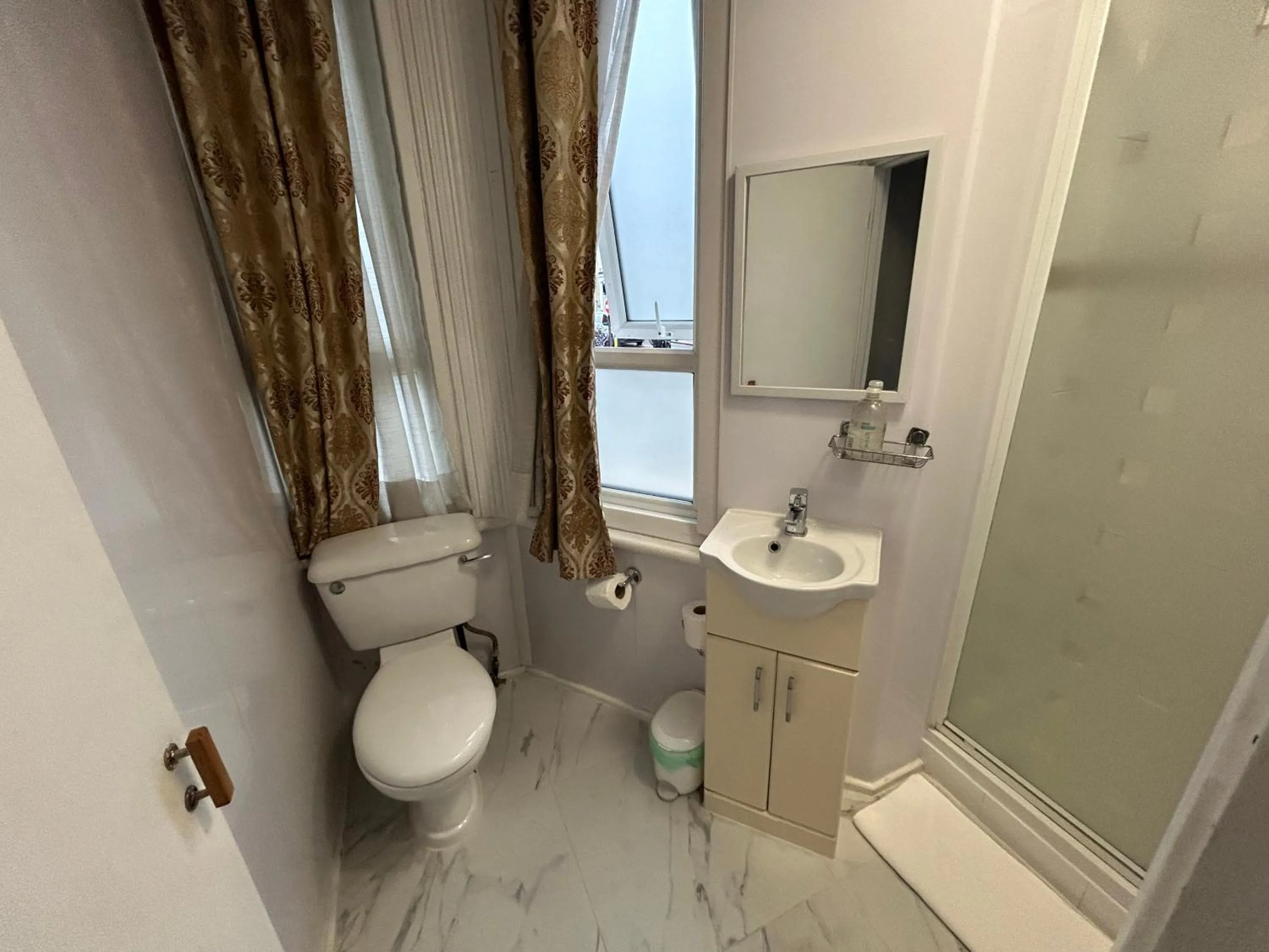 Shower in Earls Court Hotel