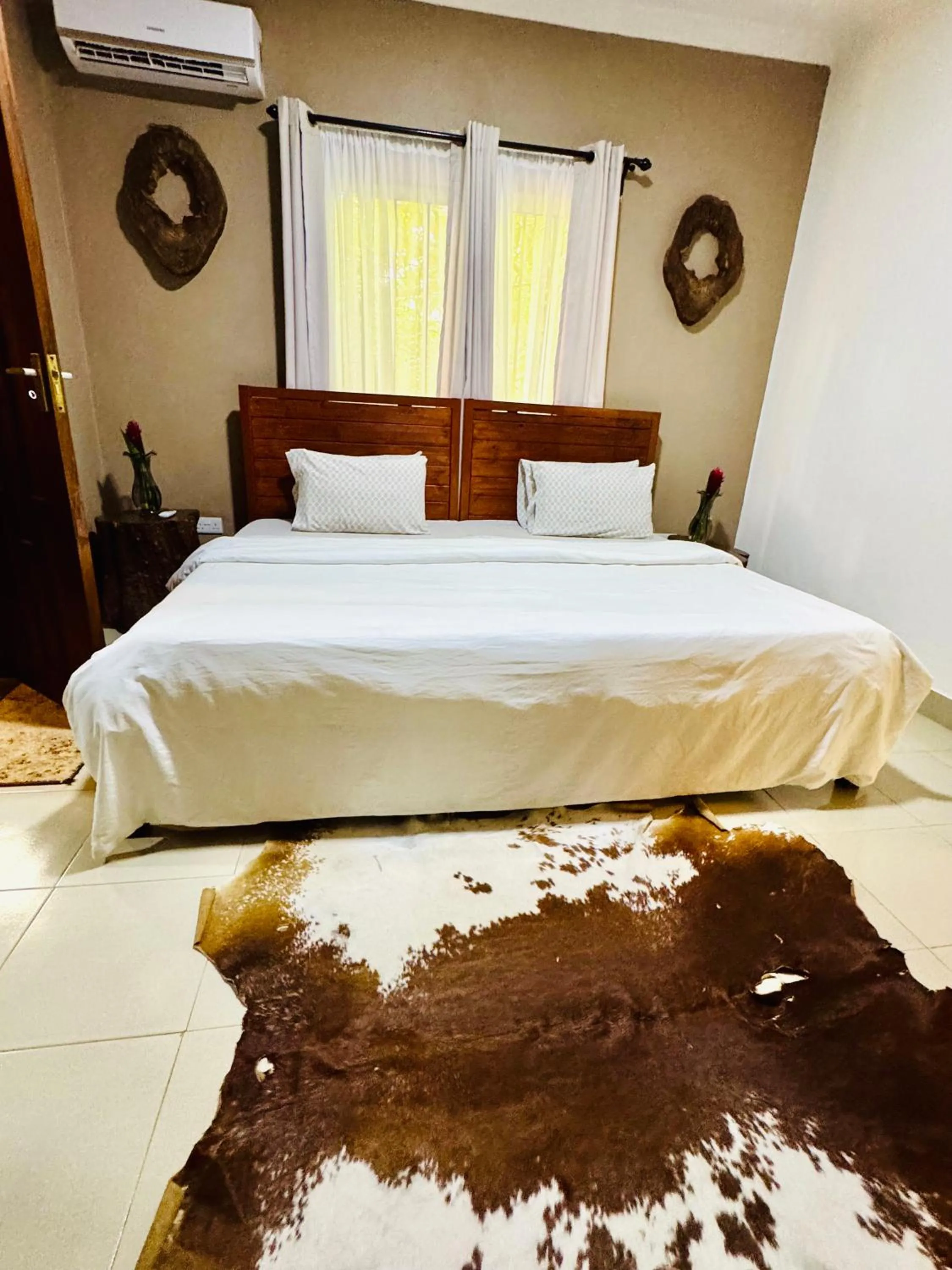 Bed in Tulivu Kilimanjaro Retreat