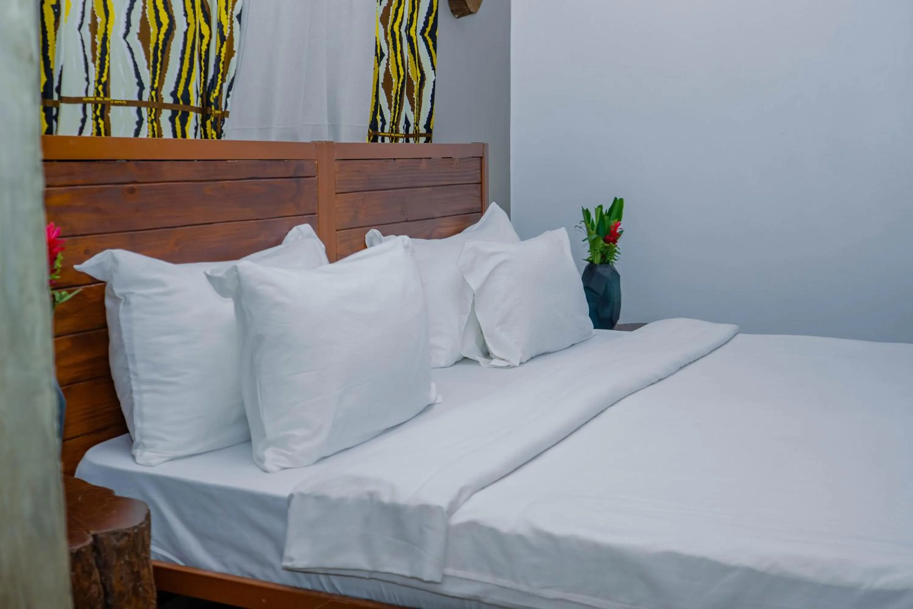 Bed in Tulivu Kilimanjaro Retreat