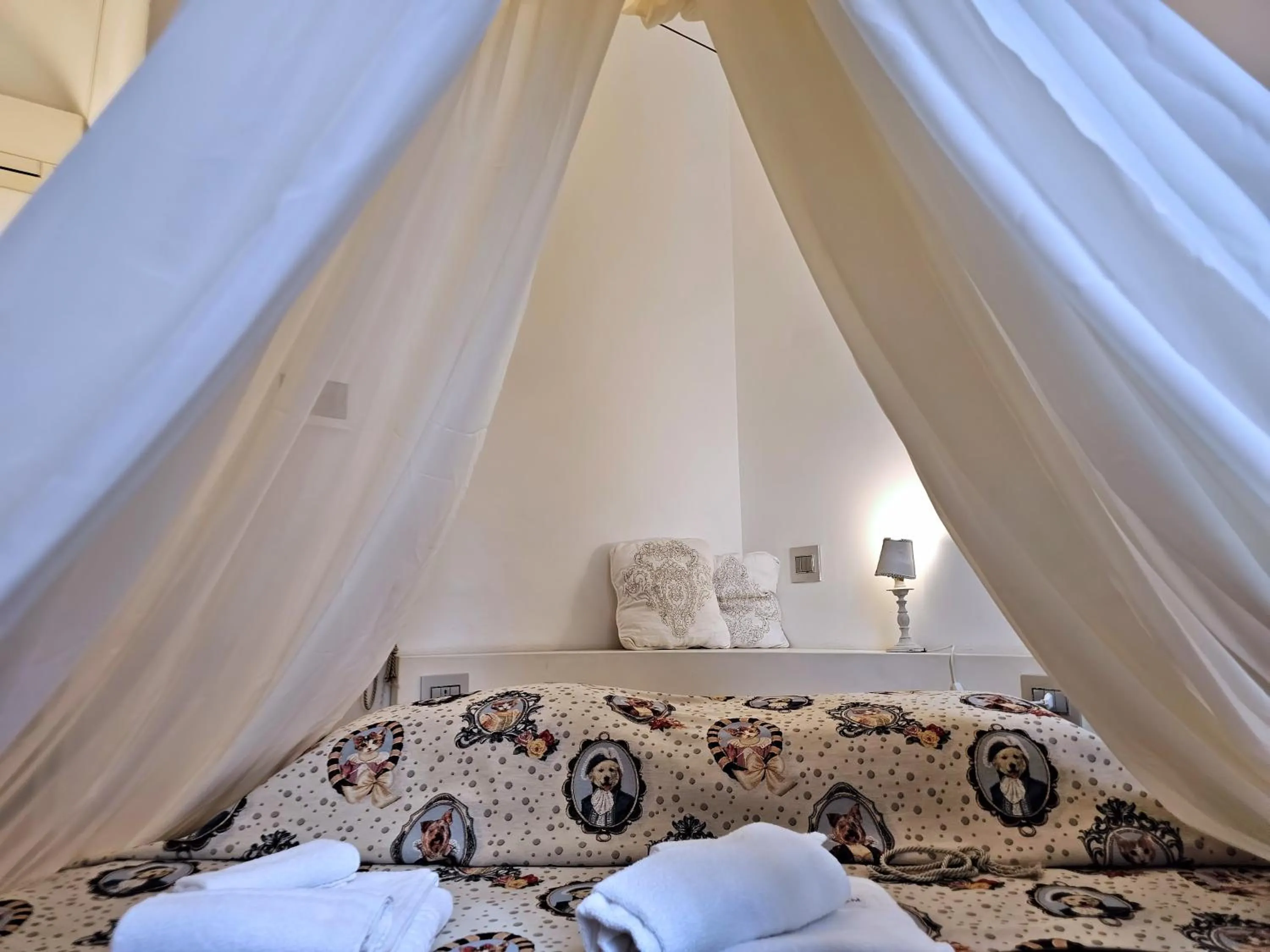 Bed in AB Suite Innovative Design B & B