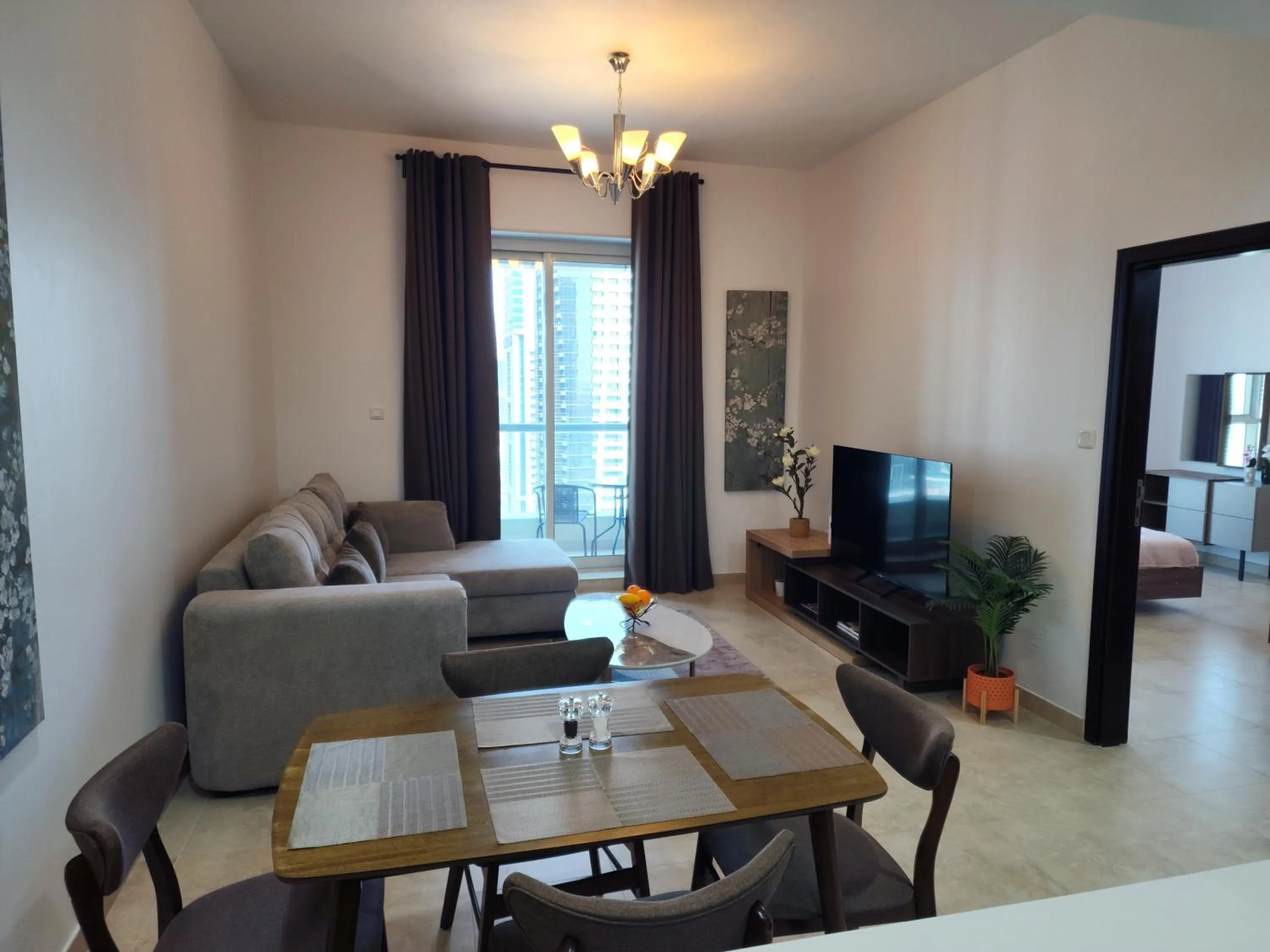 Communal lounge/ TV room in Preatoni Tower - JLT by Golden Casa