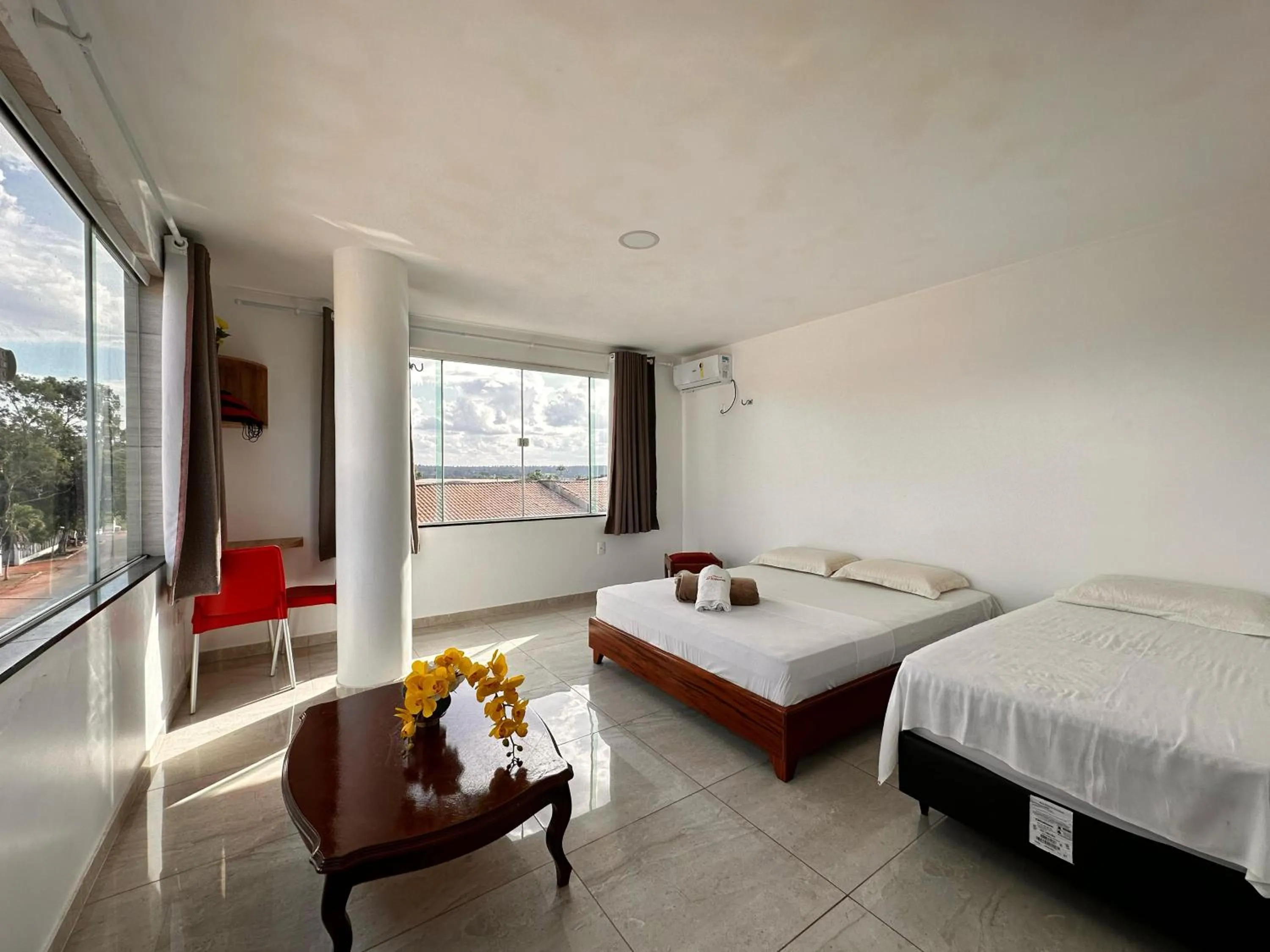 Bed in Pousada Diamante