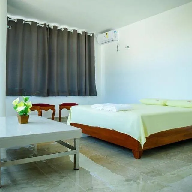 Bed in Pousada Diamante