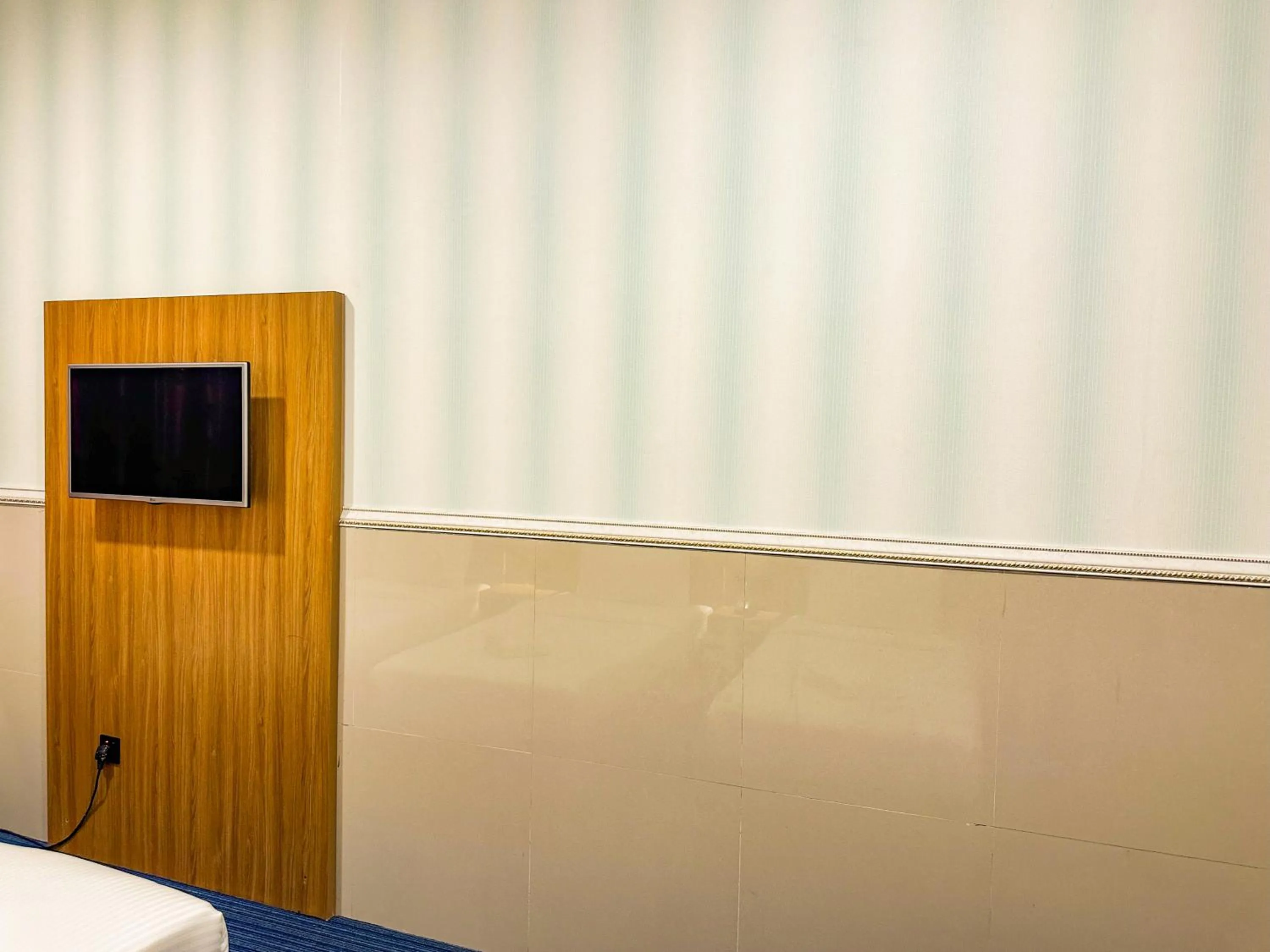 TV and multimedia, Bed in TAMARIND HOTEL