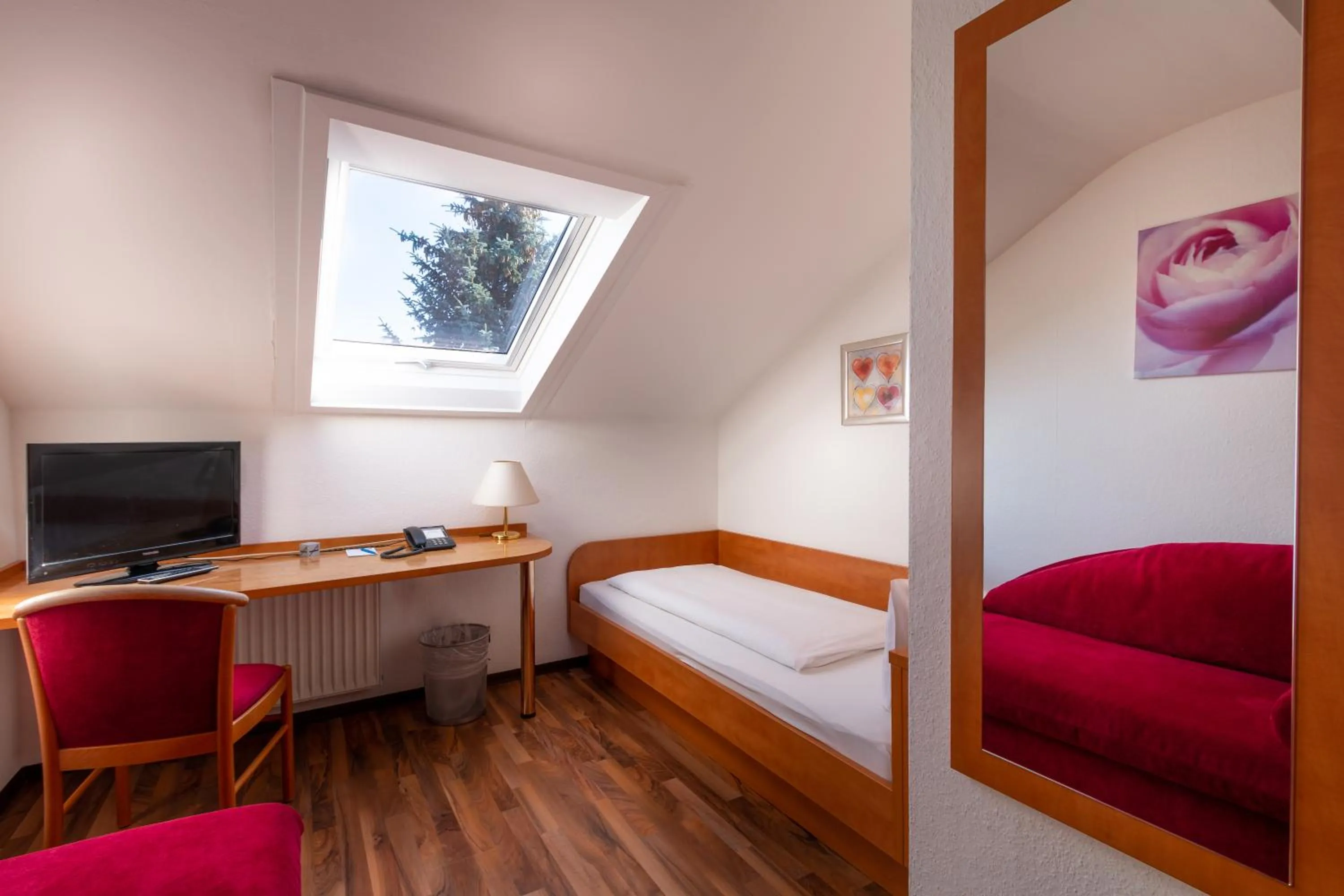 Bed in Hotel Zum Rosengarten