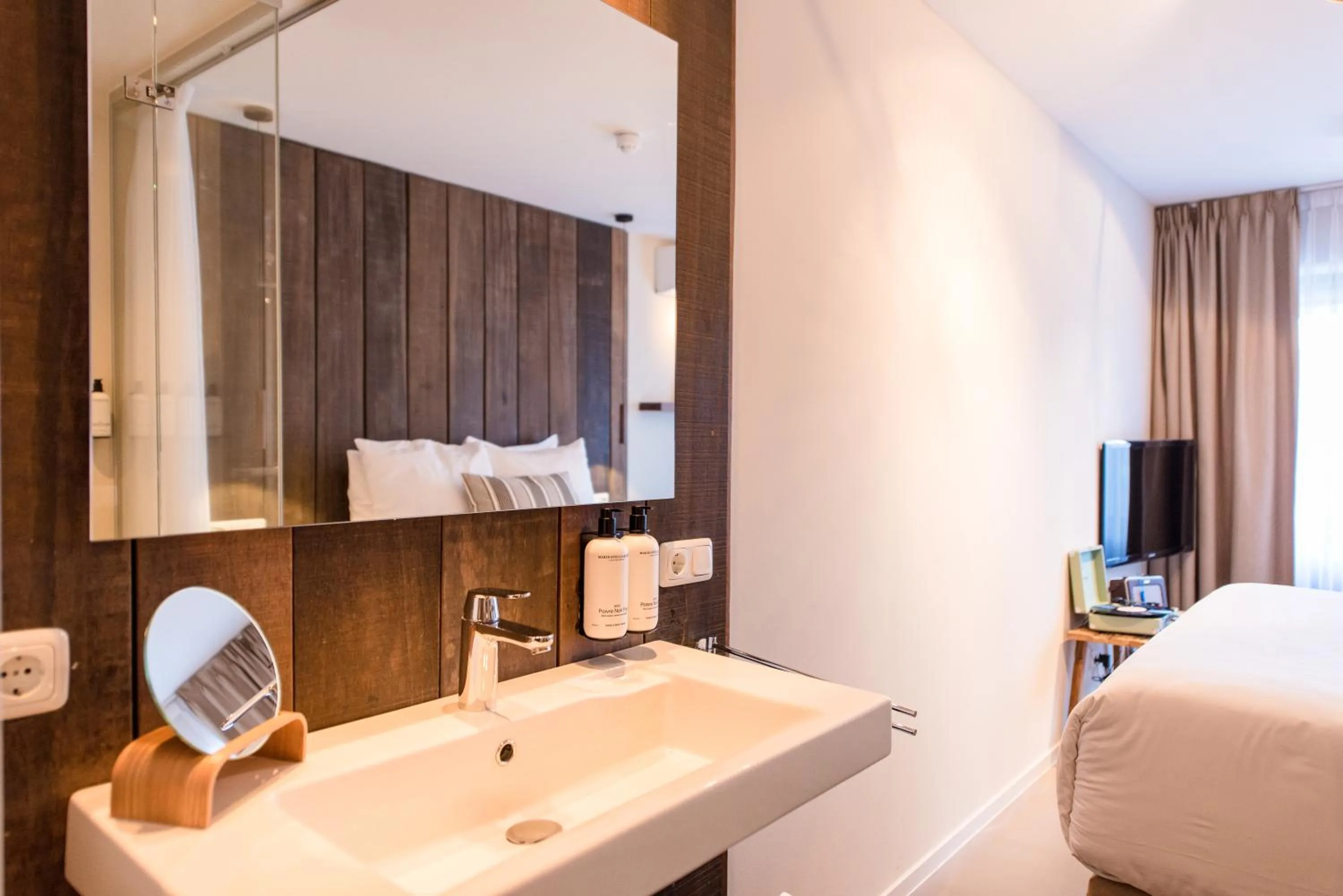 Bed in Van Heeckeren Hotel