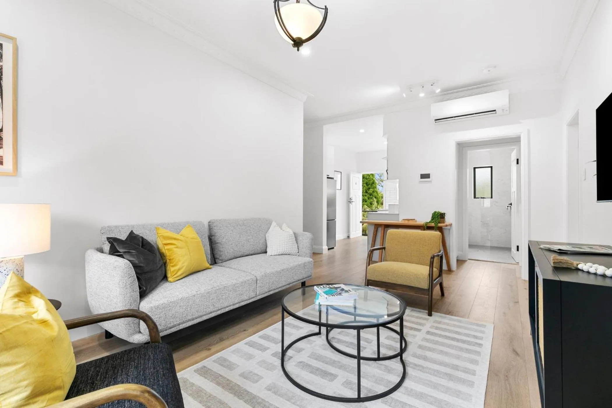 Living room in Hamilton Lodge Apartments by Urban Rest