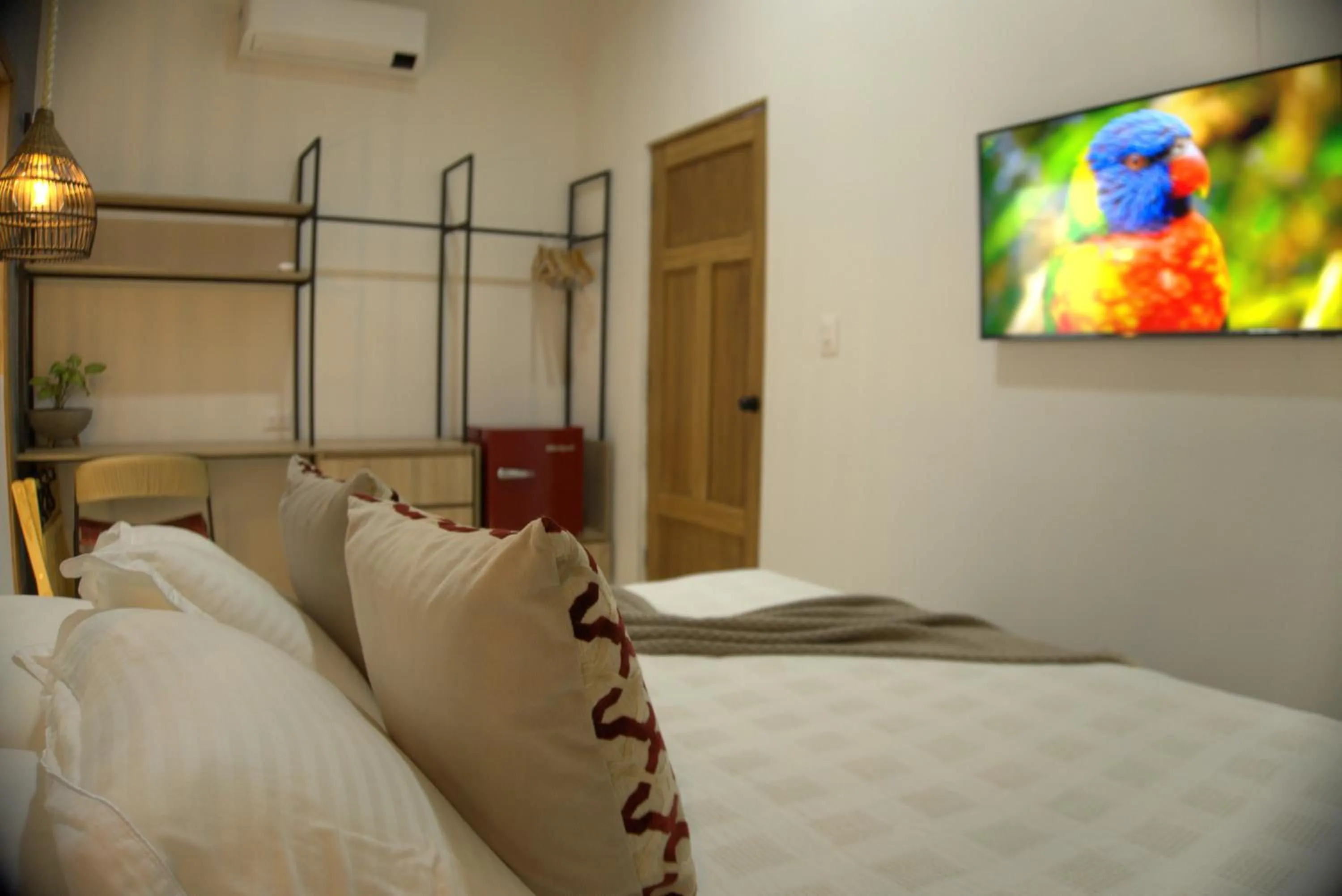 Bed in Cannatel Exclusive Hotel