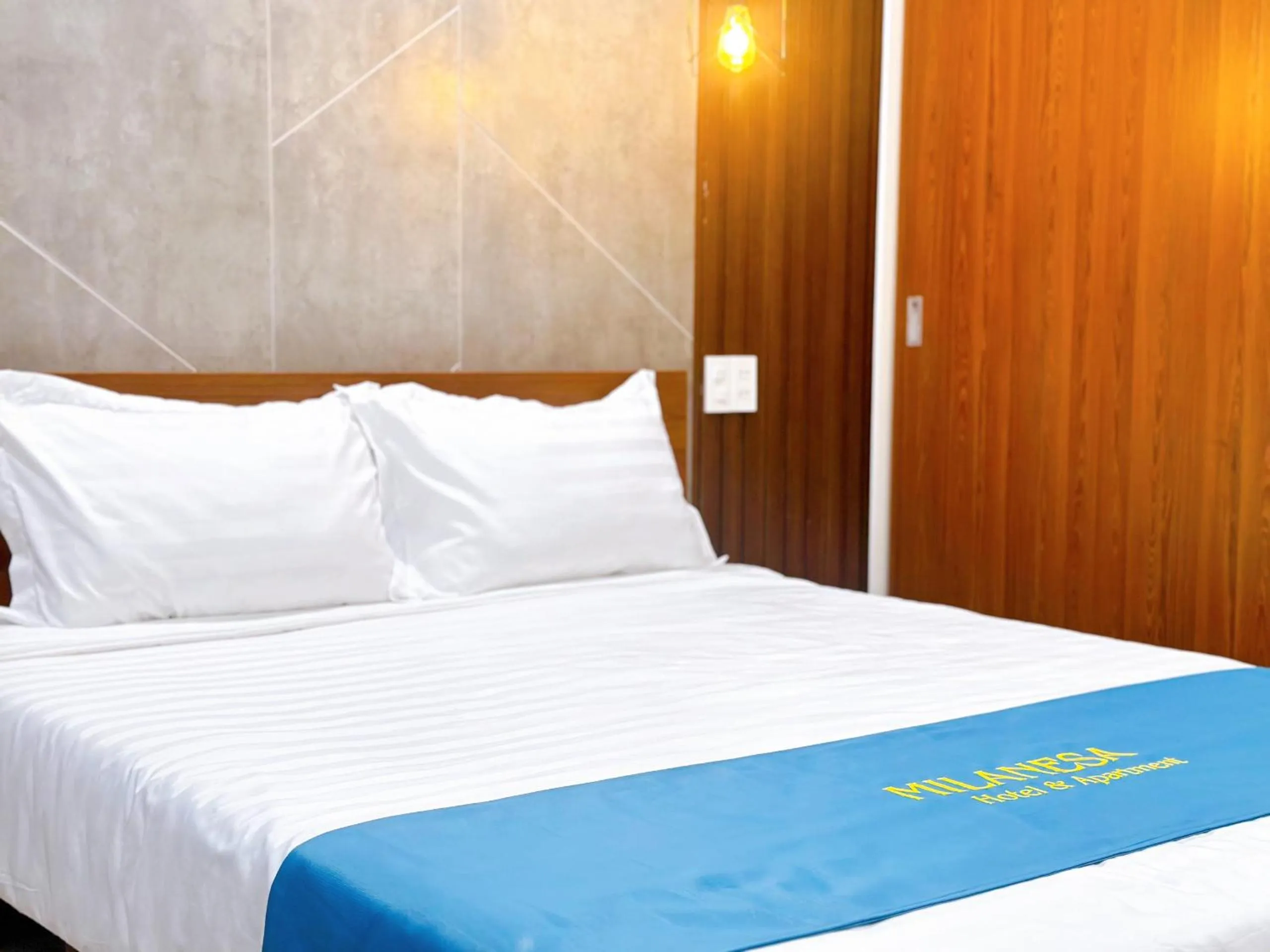 Bed in Milanesa Hotel and Apartment