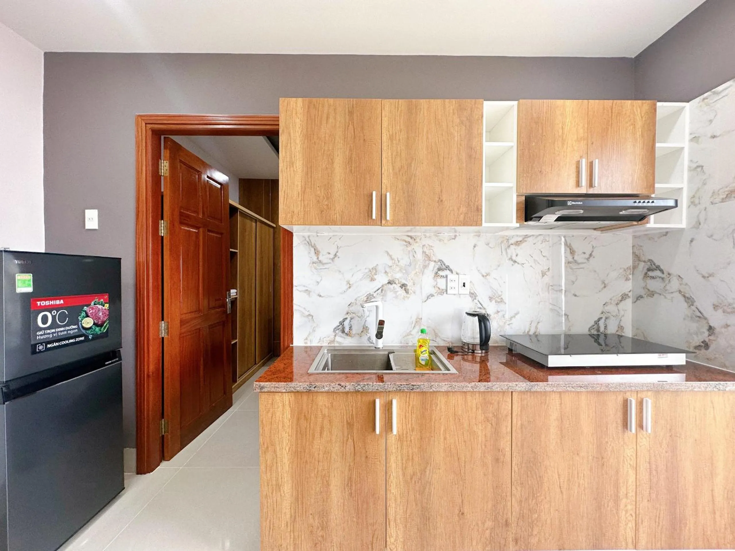 Kitchen or kitchenette in Milanesa Hotel and Apartment