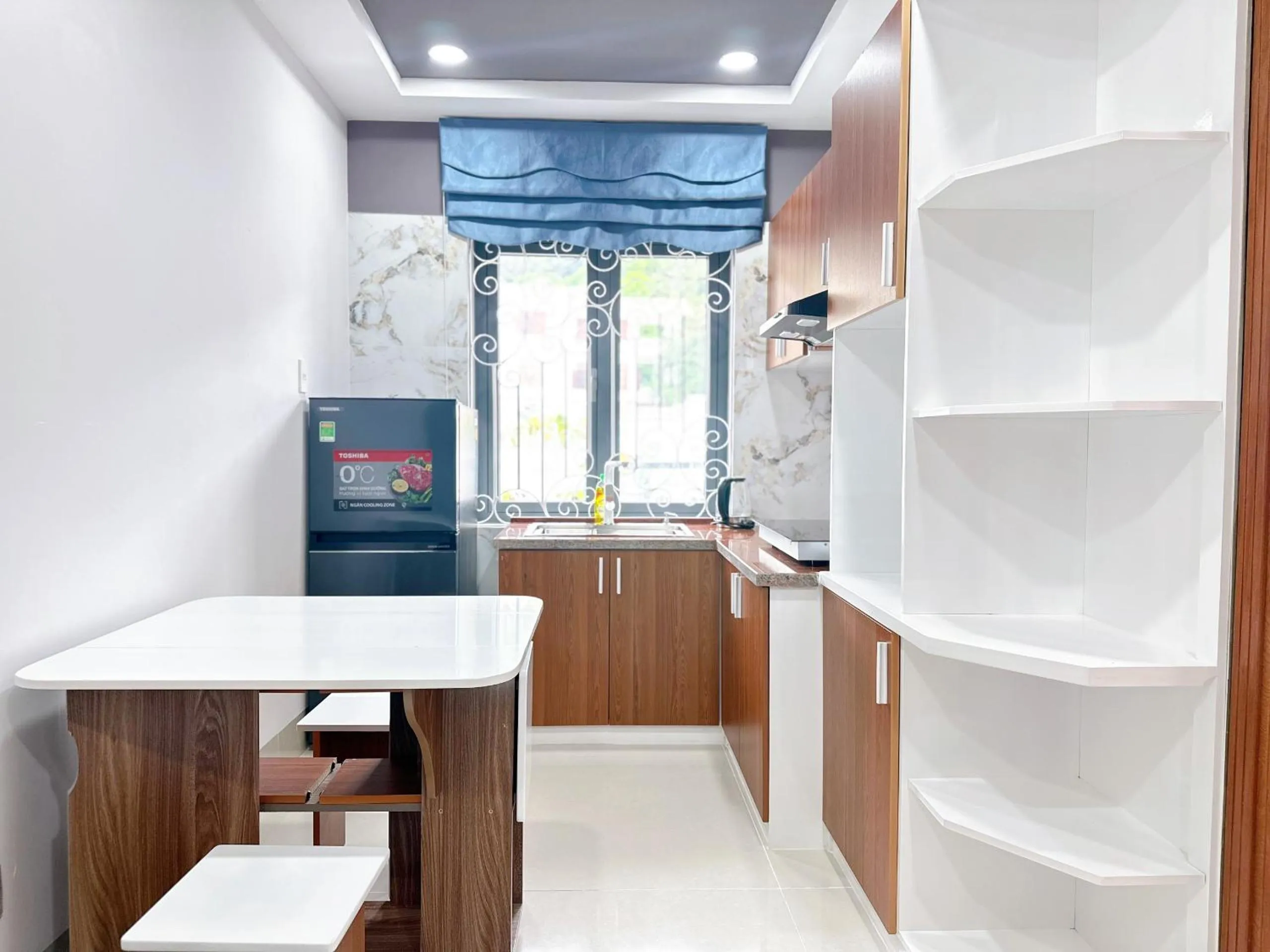 Kitchen or kitchenette in Milanesa Hotel and Apartment