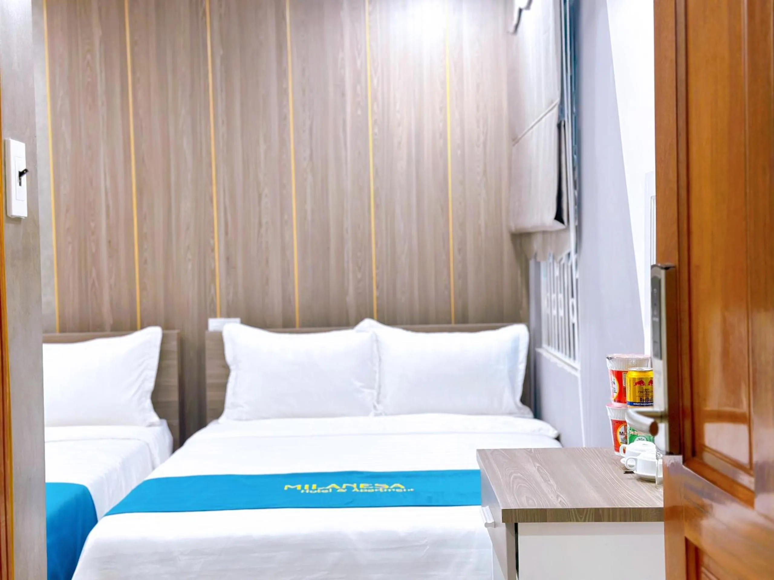 Bed in Milanesa Hotel and Apartment