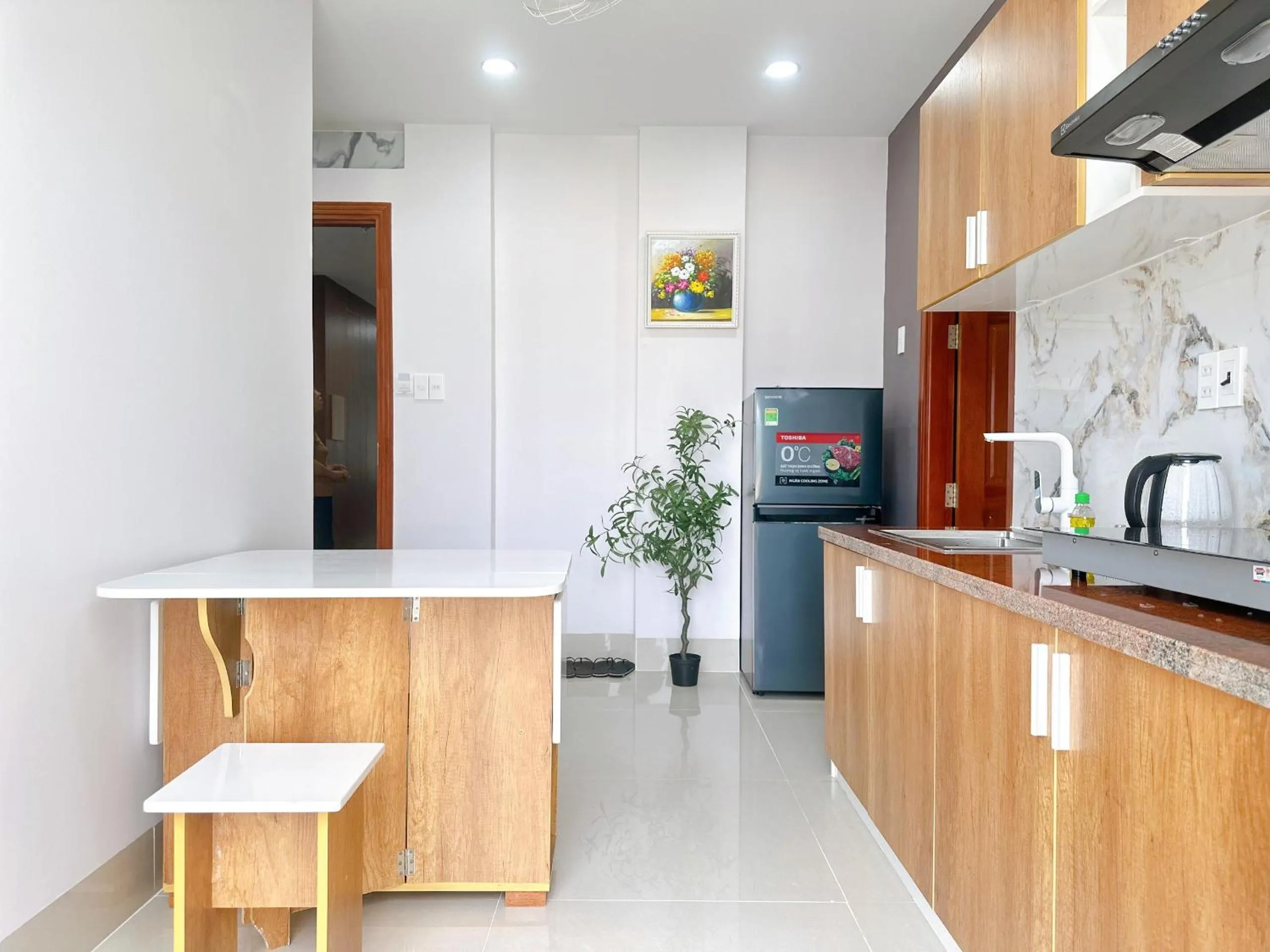 Kitchen or kitchenette in Milanesa Hotel and Apartment
